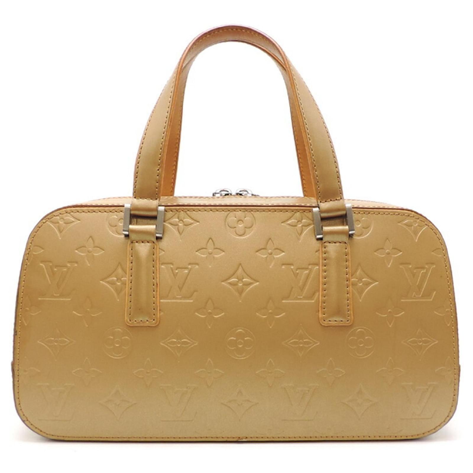 Louis Vuitton Shelton Hand Bag