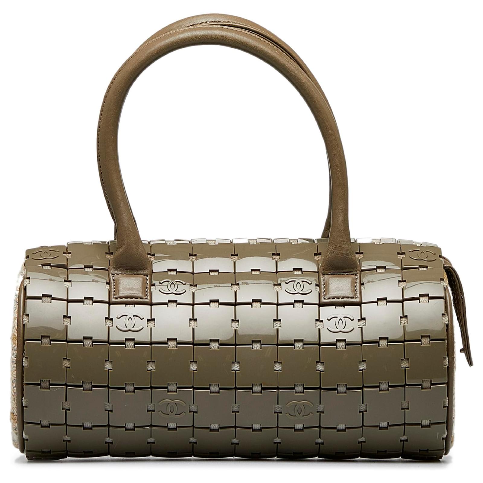 Chanel Gray Lucite Puzzle Barrel Handbag Grey Plastic ref.945676 - Joli  Closet