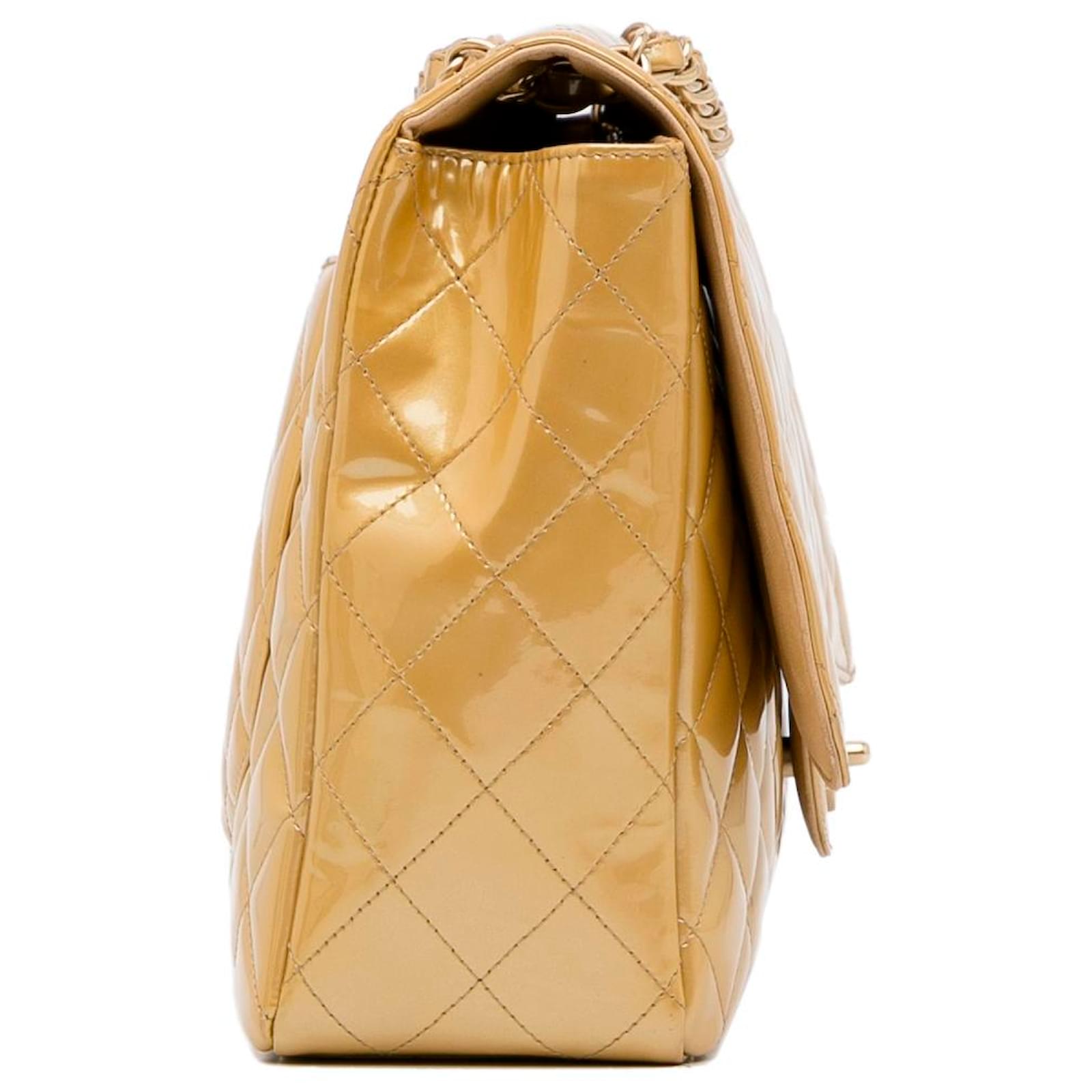 Chanel Gold Maxi Classic Patent Single Flap Golden Leather Patent leather  ref.950192 - Joli Closet