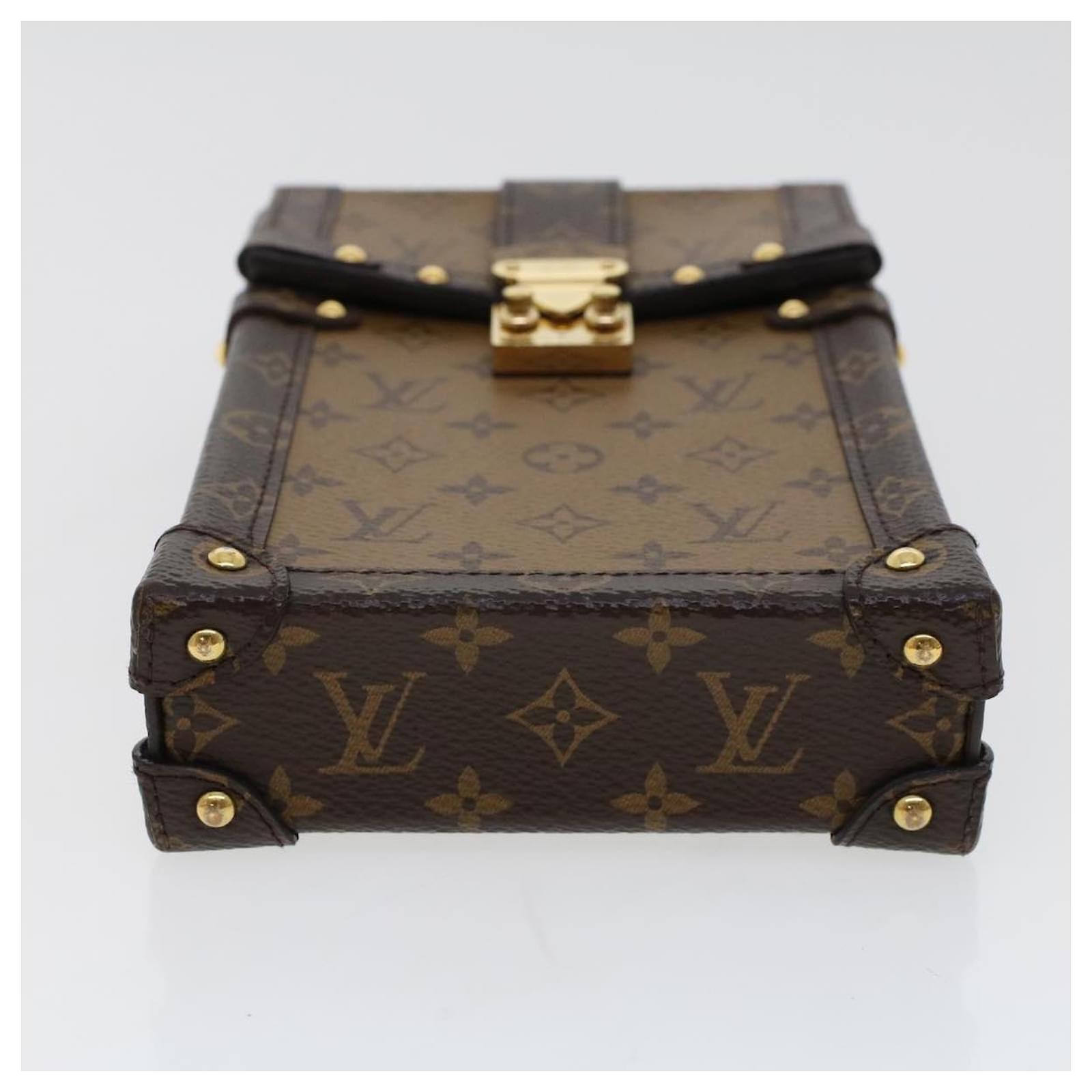 Louis Vuitton, Bags, Lv Reverse Monogram Vertical Trunk Pochette