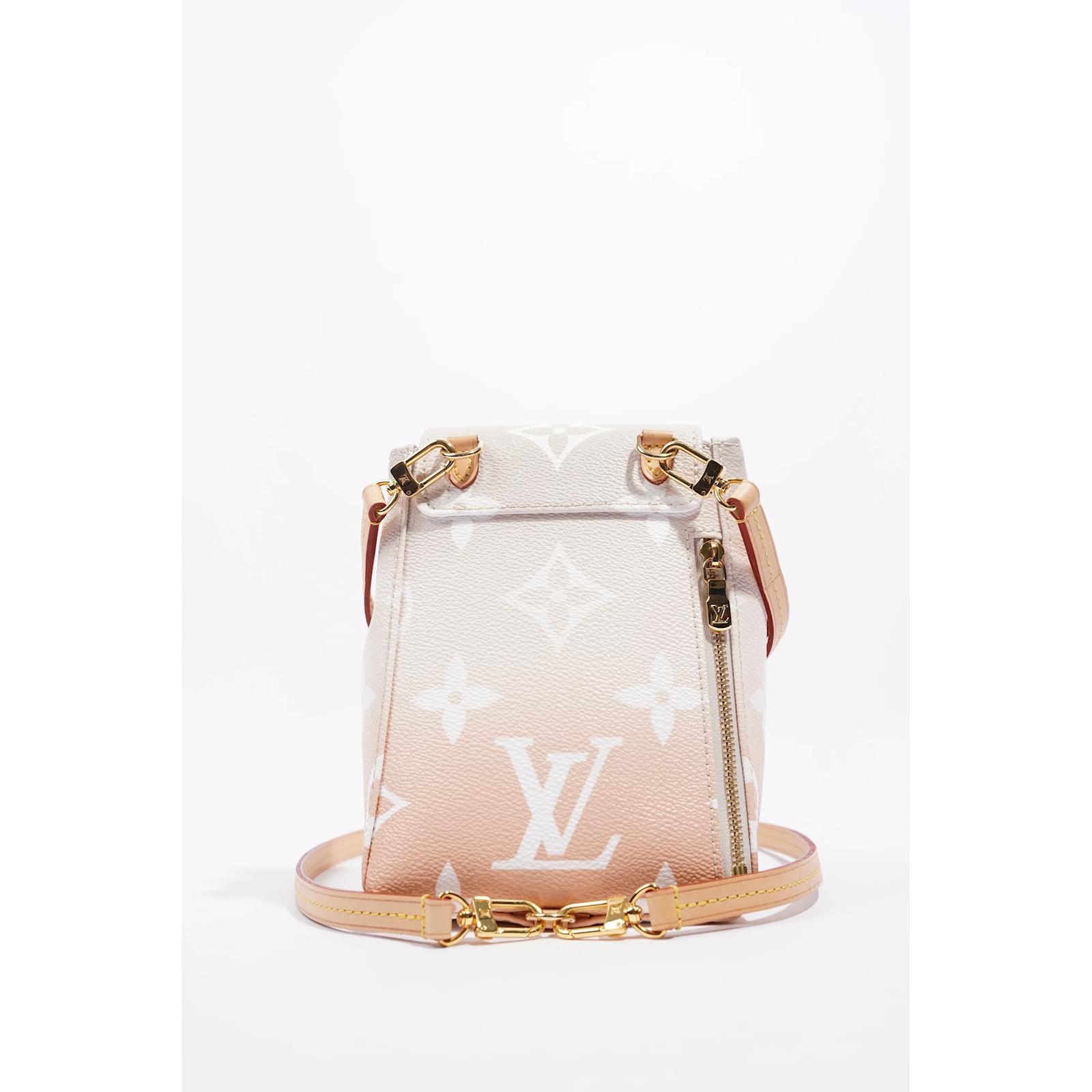 louis vuitton by the pool mini backpack Brume Monogram Coated Canvas GHW a tiny backpack in monogram canvas with a gradated color effect as part of the by the pool collection of accessories Louis Vuitton Womens Tiny Backpack