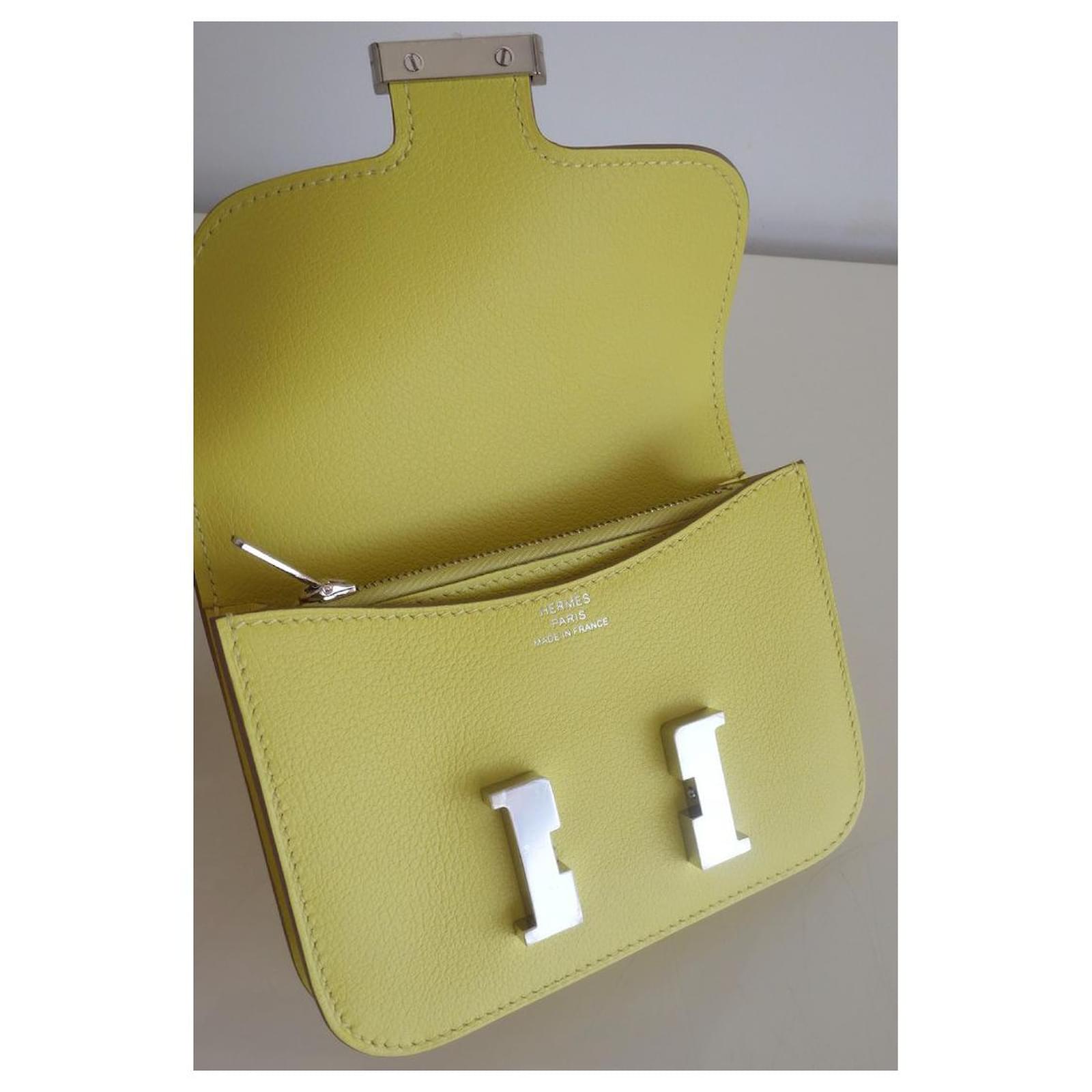 Constance Slim Hermès purse Yellow Leather ref.984355 - Joli Closet