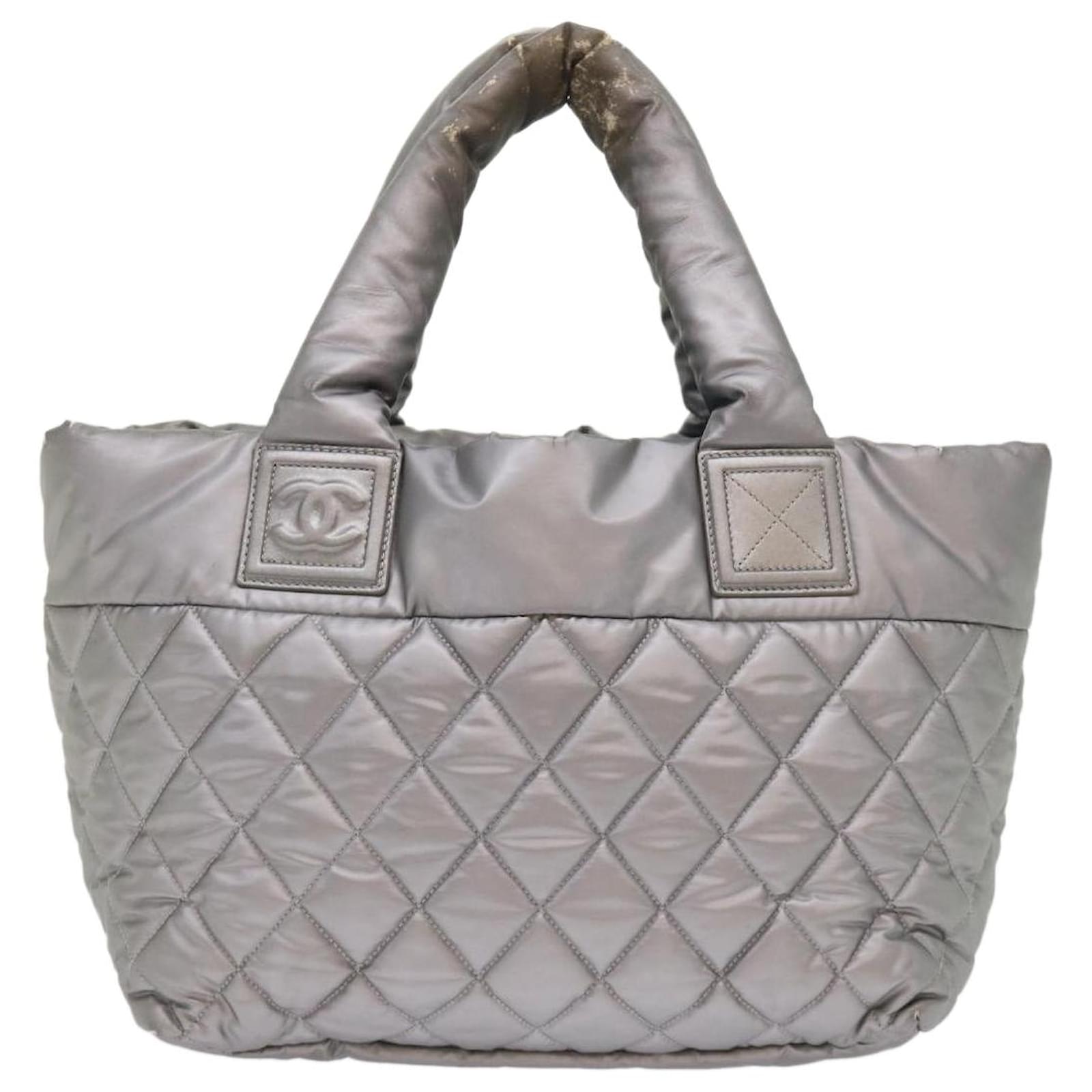 CHANEL  BLACK QUILTED NYLON AND LEATHER WITH SILVER