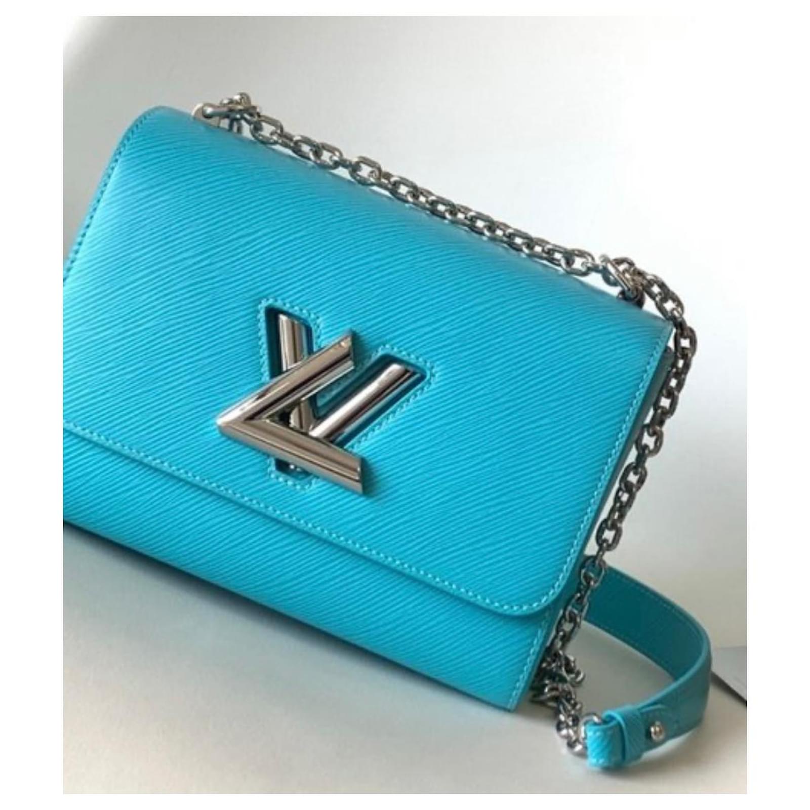 Louis Vuitton Handbags Blue Light blue Leather ref.996794 - Joli Closet