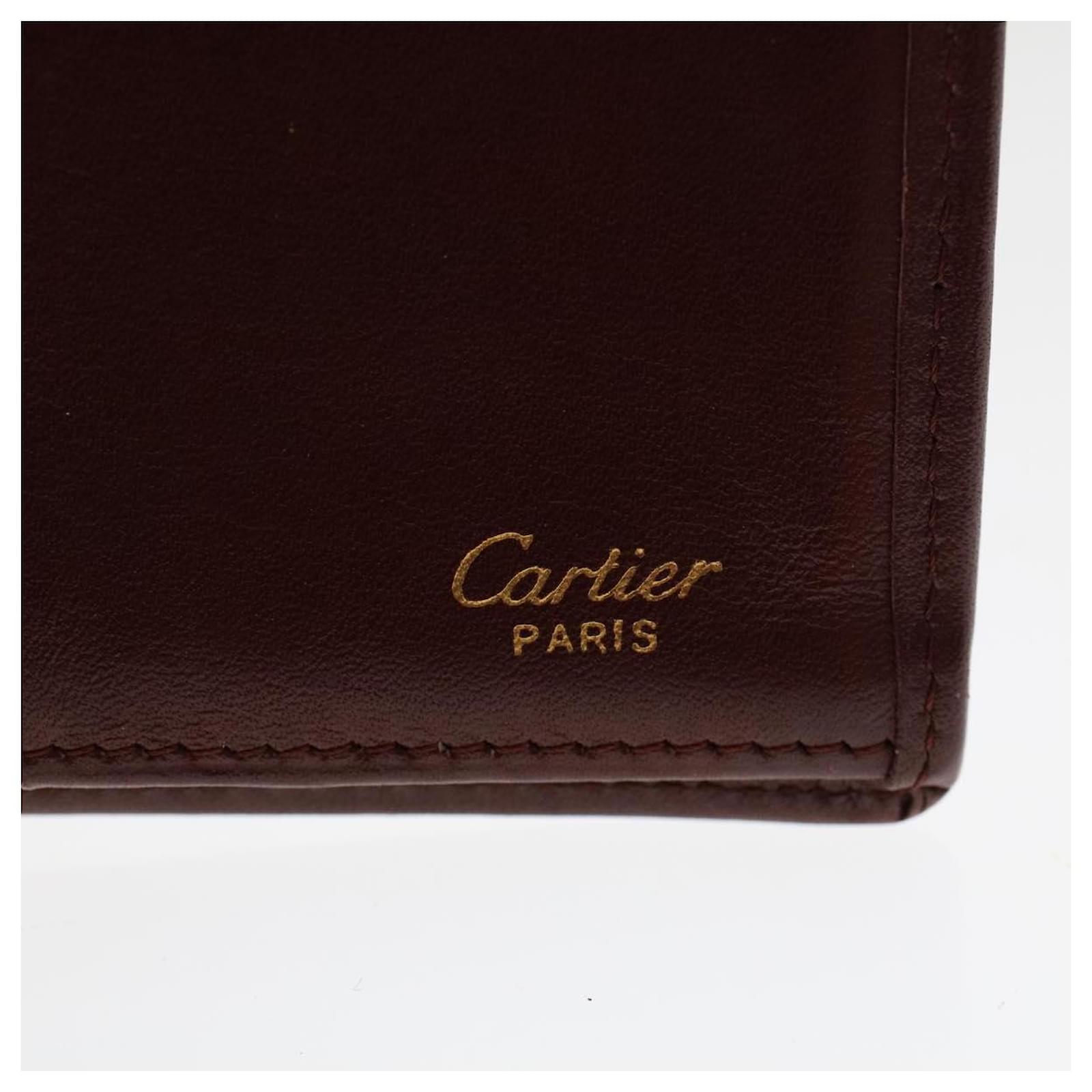 Portafoglio clearance cartier falso