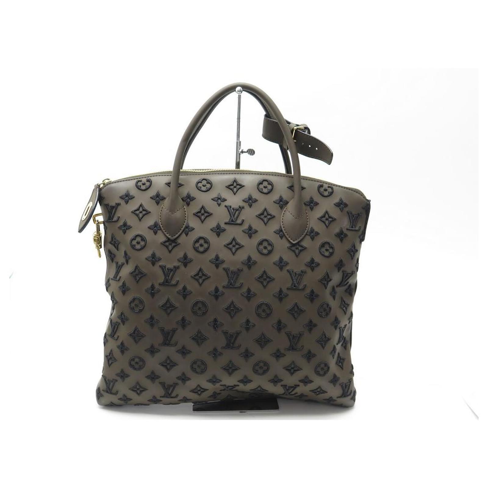 Louis Vuitton Monogram Addiction Lockit Vertically