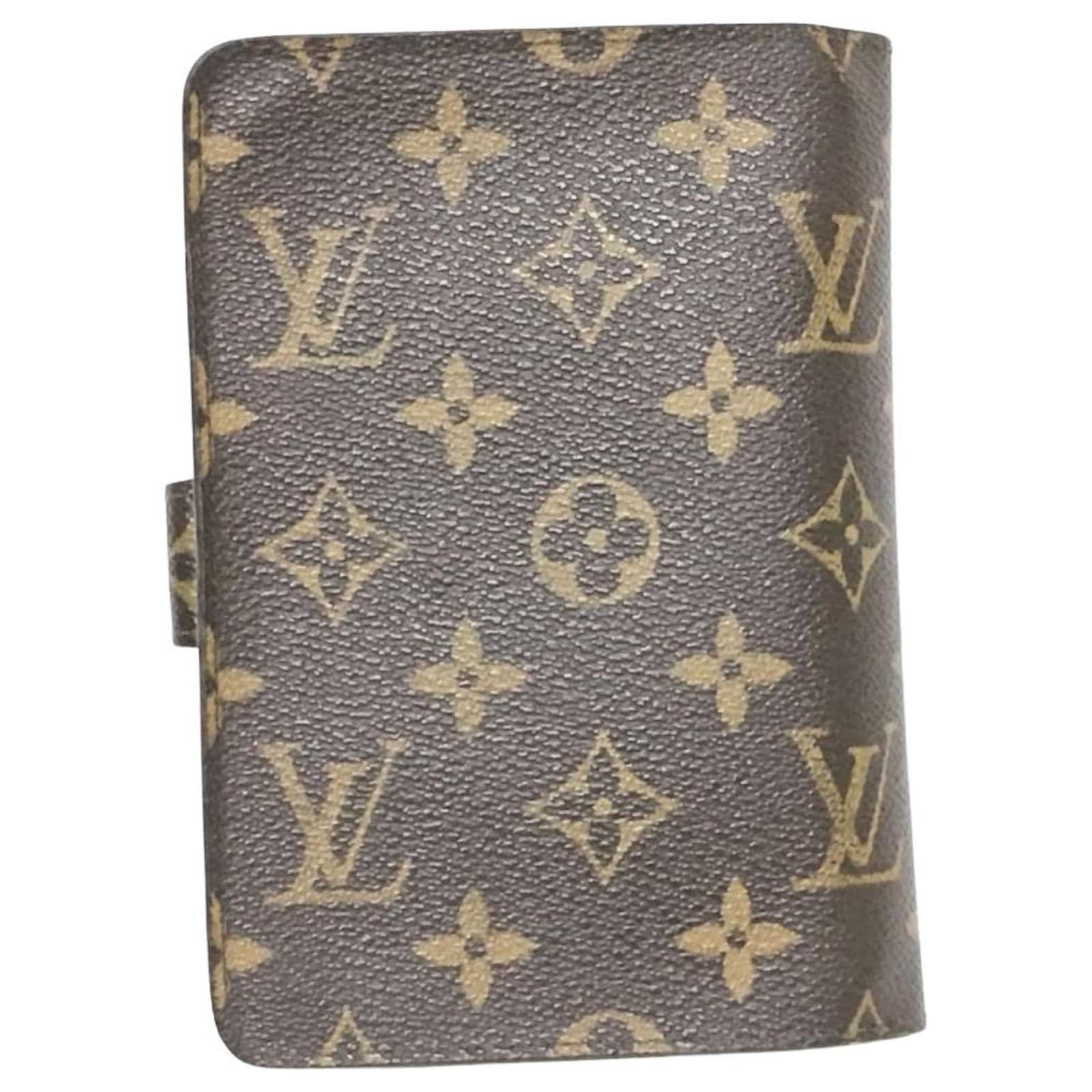 Bolsa saco vintage Louis Vuitton. Apresenta desgastes d