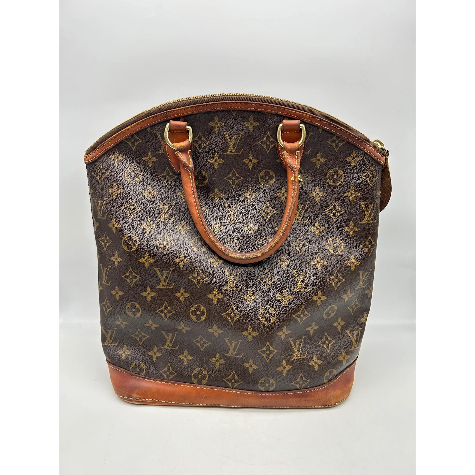 Lockit LOUIS VUITTON Handbags T. leather Brown ref.1014019 - Joli Closet