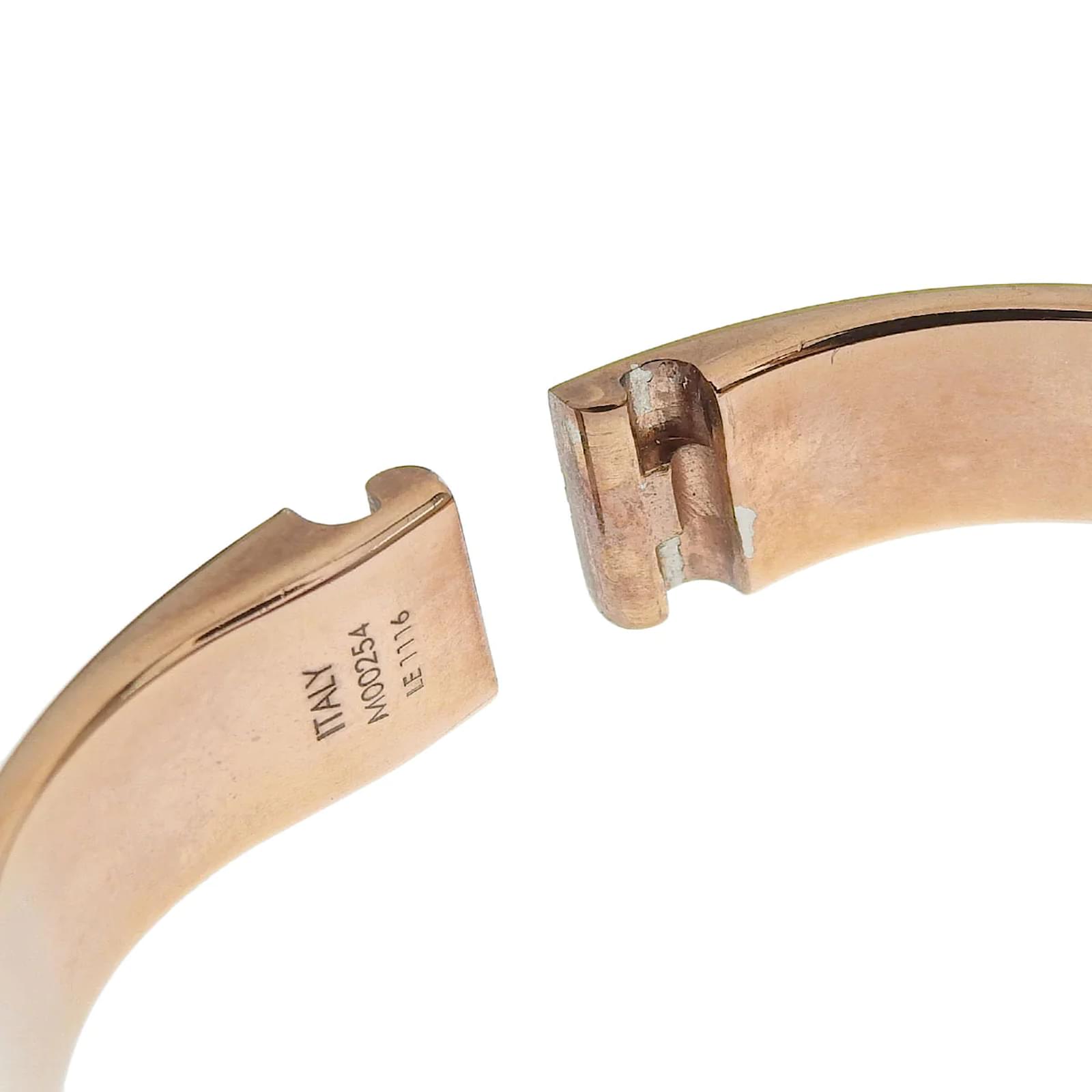 Louis VUITTON Nanogram cuff bracelet in gold-plated met…