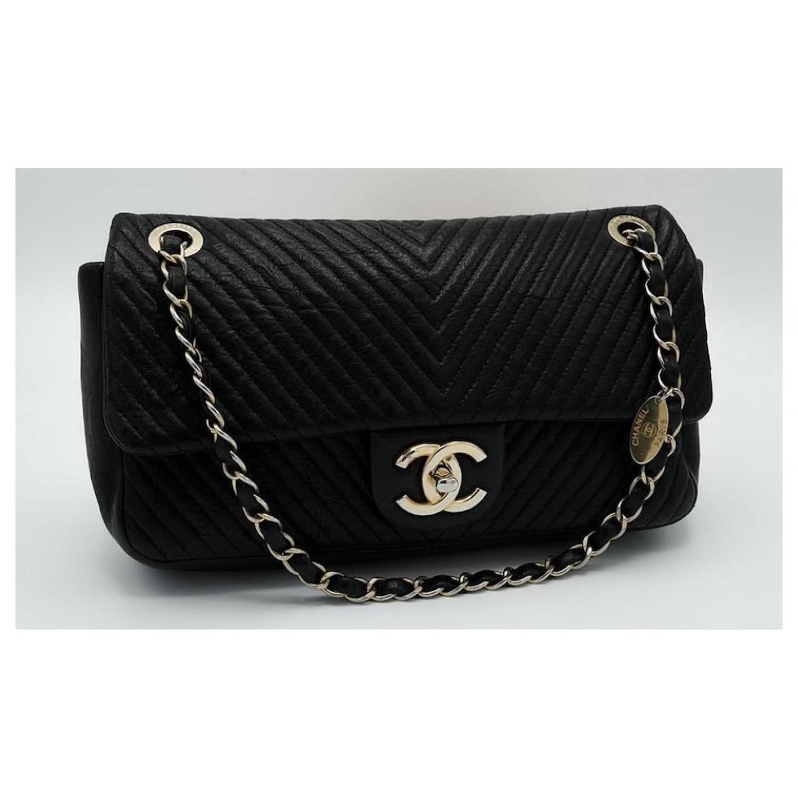 Handbags Chanel Chanel Medium Black Leather Medallion Charm Surpique Wrinkled Lambskin Chevron V Stitch Classic Flap Bag with Light Gold Tone Hardware
