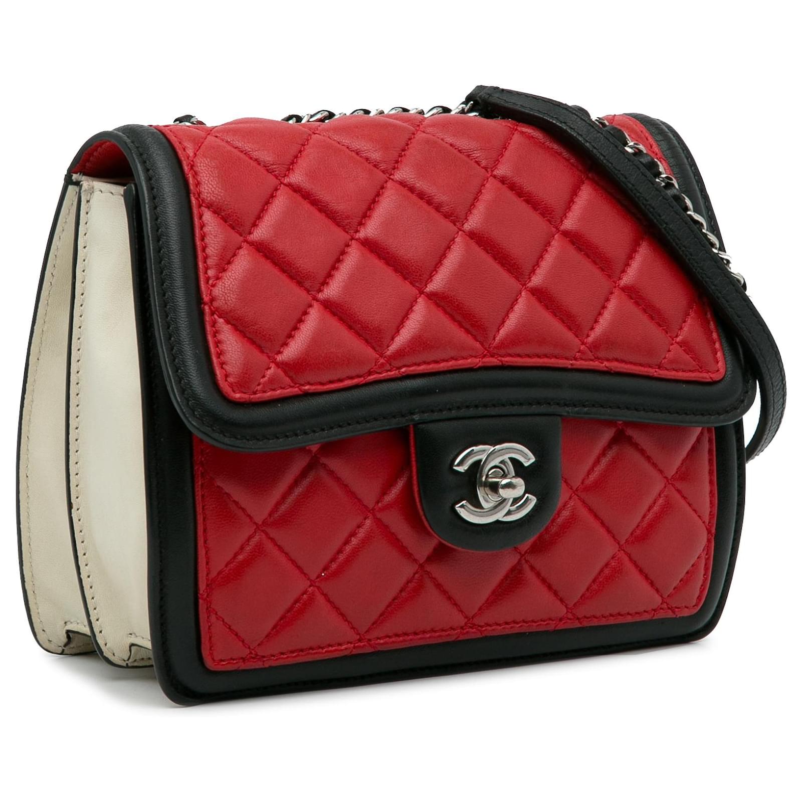 red and white chanel bag black