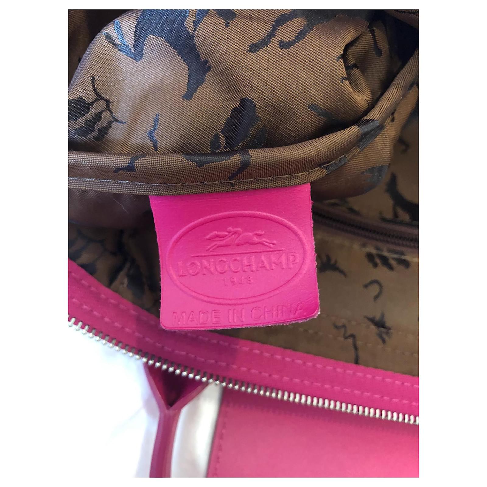 Longchamp bag in fuchsia pink leather Pliage collection Silvery