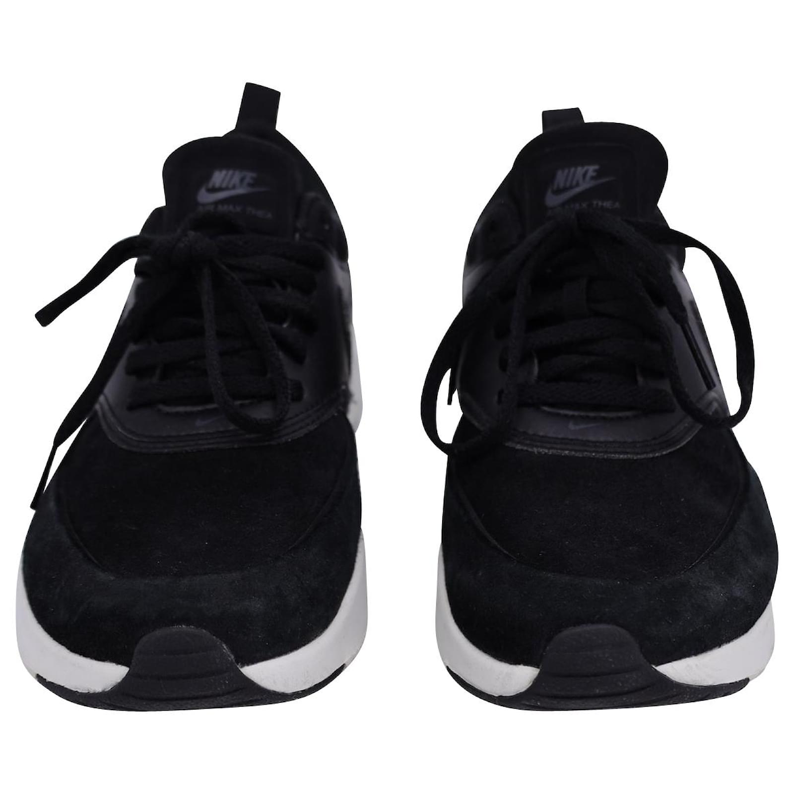 nike thea black leather