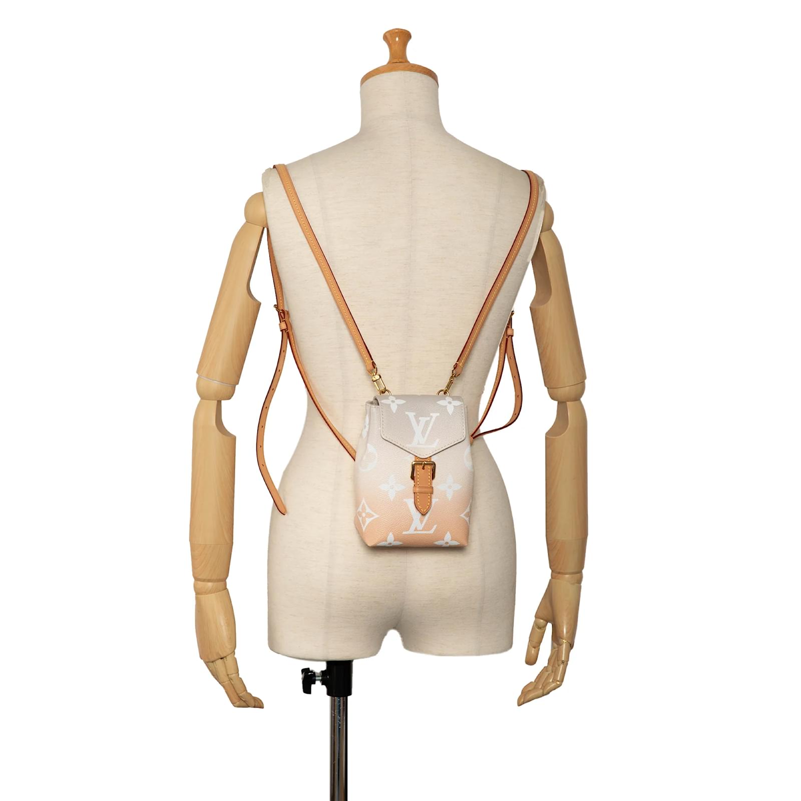 louis vuitton by the pool mini backpack Tiny Monogram Empreinte Dove/Cream Coco Approved Studio while the zipped back pocket is ideal for cards. Orange Louis Vuitton Monogram Giant