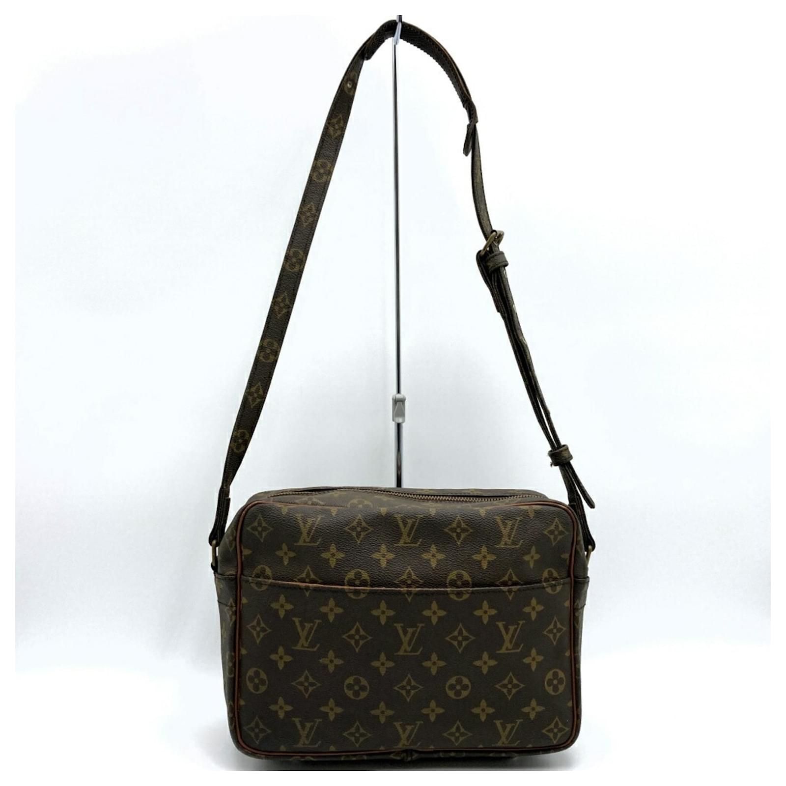 Migratour Schultertasche M45244 von Louis Vuitton Braun Lackleder 