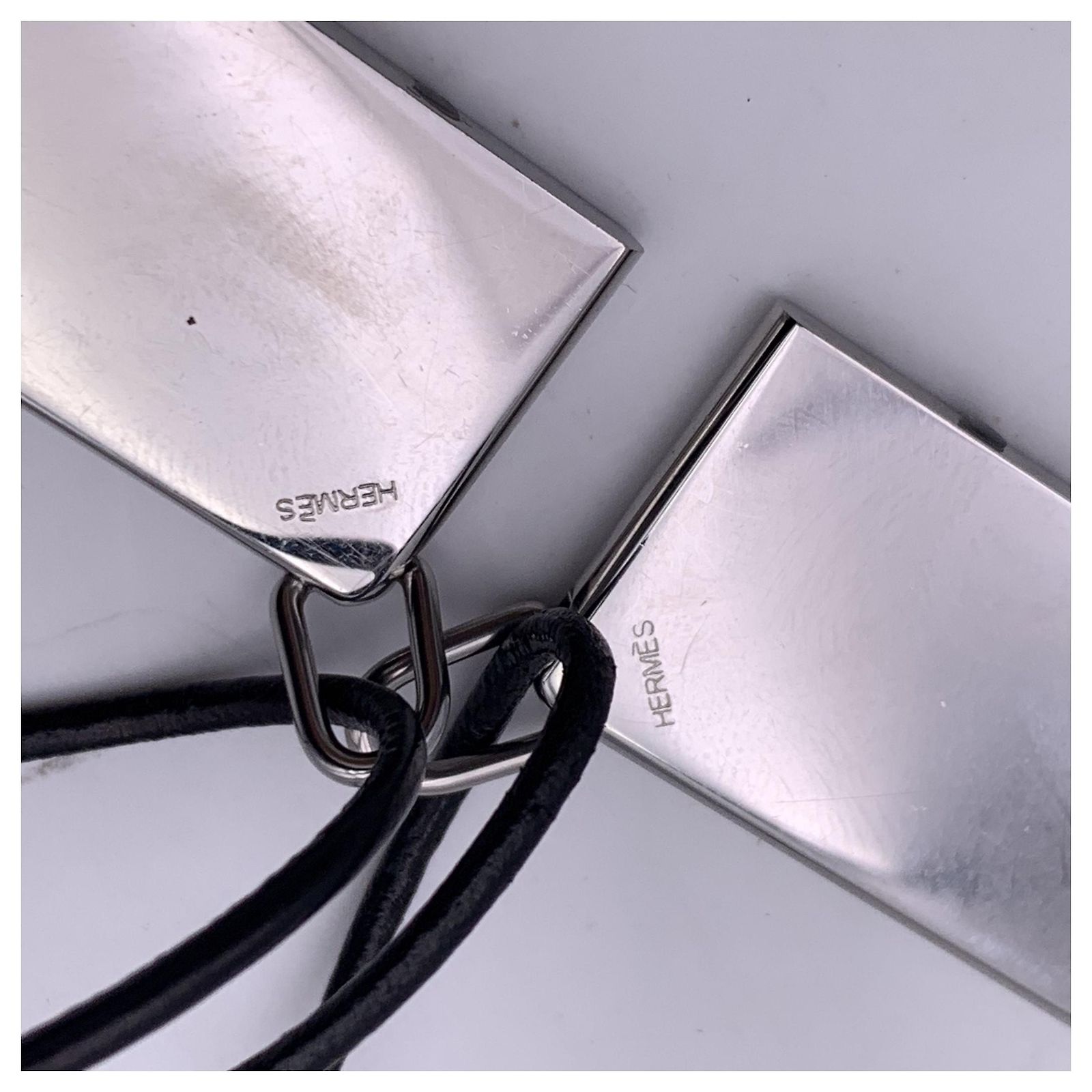 Hermès Hermes Paris Silver Metal Amour Plate Pendant Set of 2 