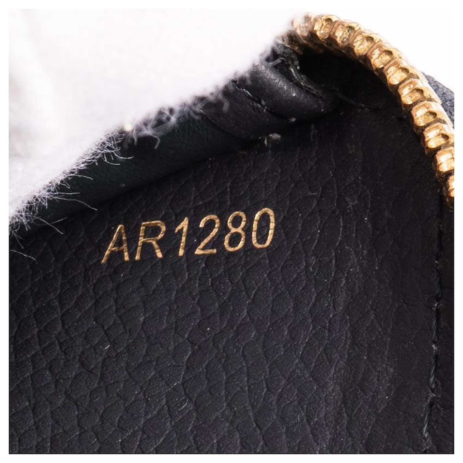 Louis Vuitton Engraved Monogram Zippy Wallet Blue