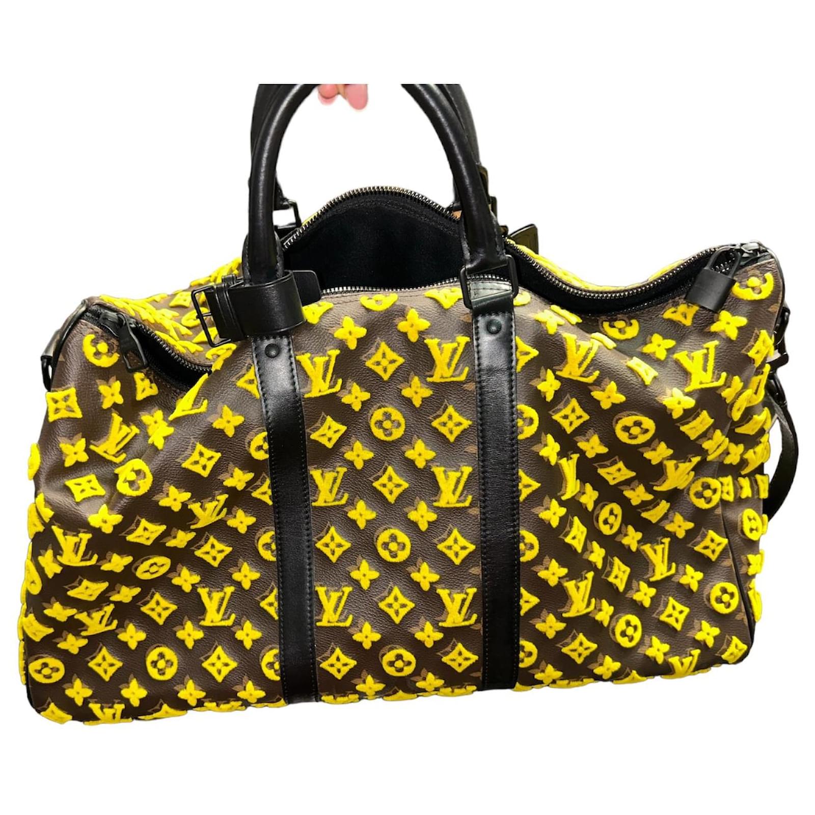 Keepall 50 Louis Vuitton travel bag yellow triangle Brown Cloth  ref.1571183