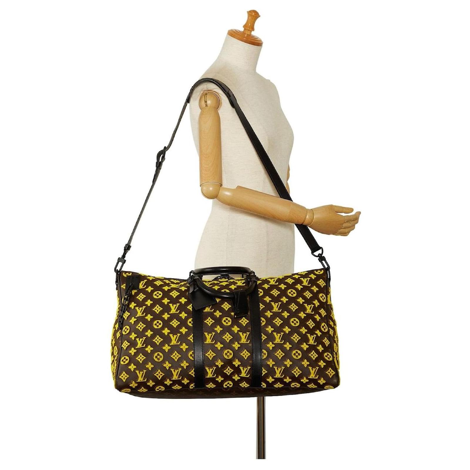 Keepall 50 Louis Vuitton travel bag yellow triangle Brown Cloth  ref.1571183