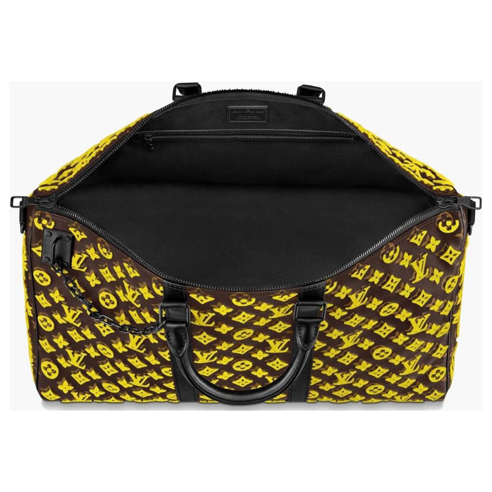Keepall 50 Louis Vuitton travel bag yellow triangle Brown Cloth  ref.1571183