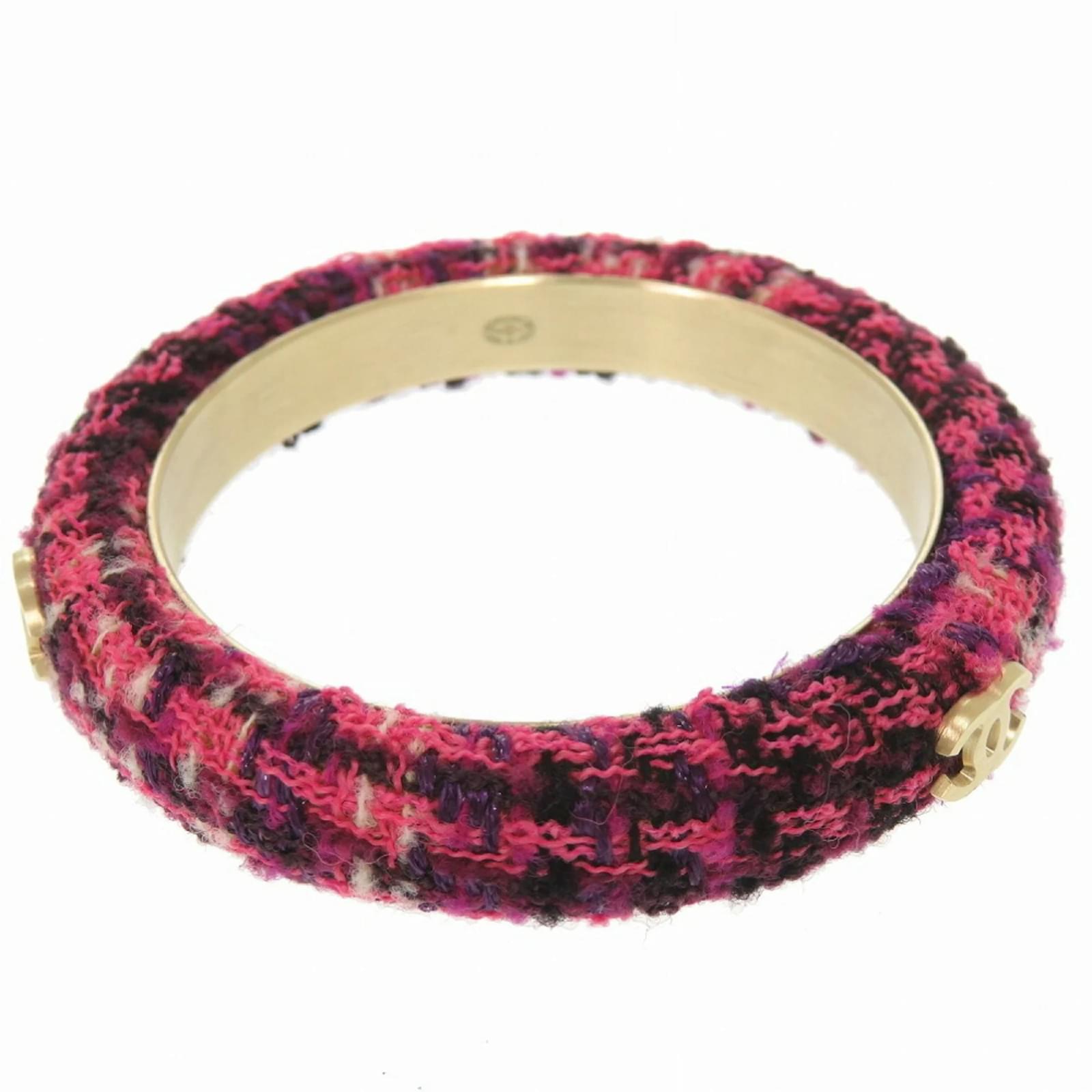 Two Coco Chanel Runway Bangle Bracelets sold at auction on