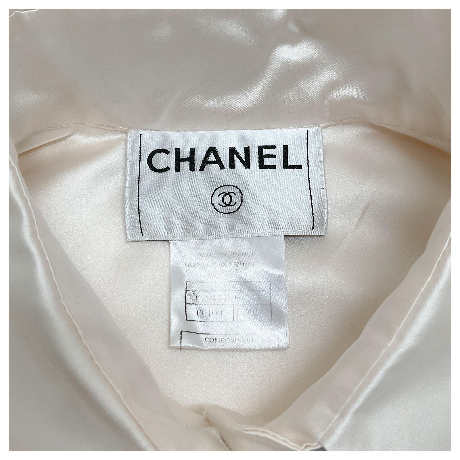 Chanel Ivory Silk Sleeveless Blouse with Black Tie Neck Cream ref 