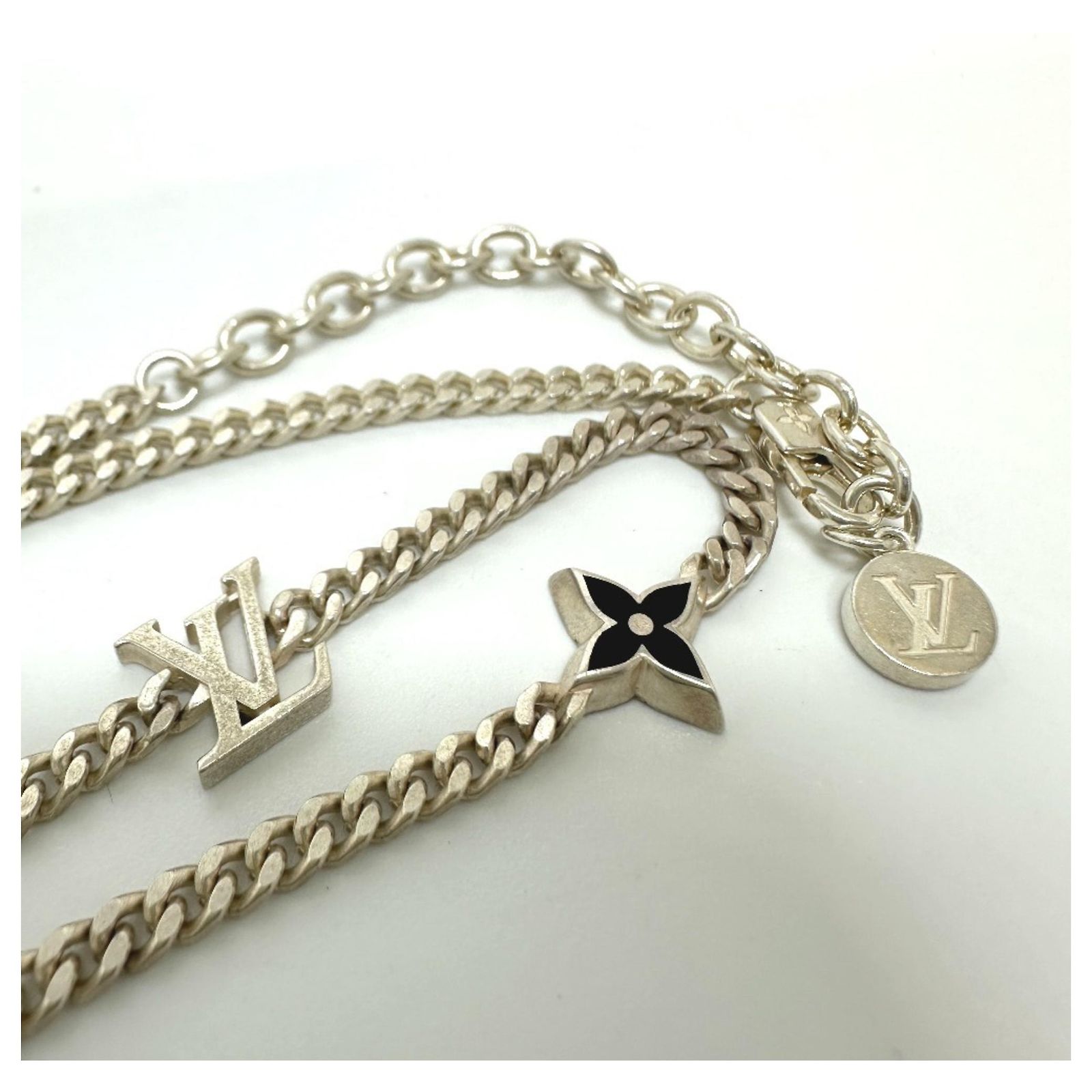 Louis Vuitton Silver-Tone Twisted Spike Charm with Cream Enamel Accents Louis Vuitton Silver 925 Necklace with LV Spike Charm  main image 4