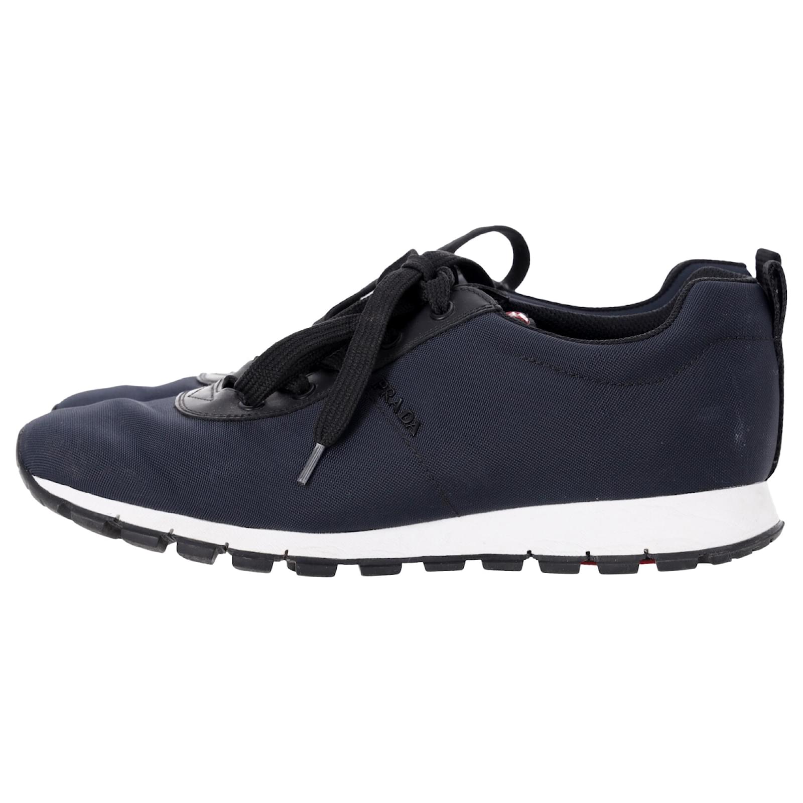 PRADA ネイビー スニーカー Prada Sport Low Top Lace Up Sneakers in Navy Blue Canvas and