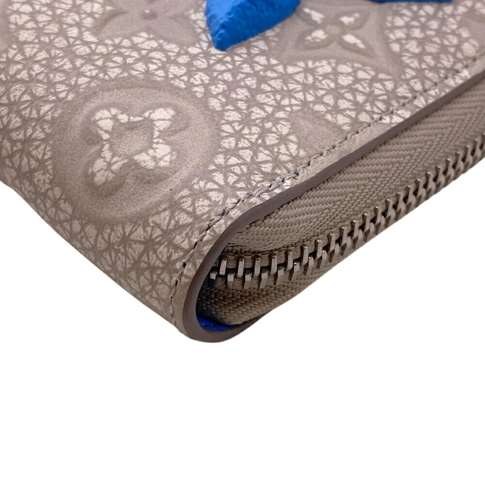 Louis Vuitton Taurillon Zippy Wallet Brown Blue Leather ref.1972891