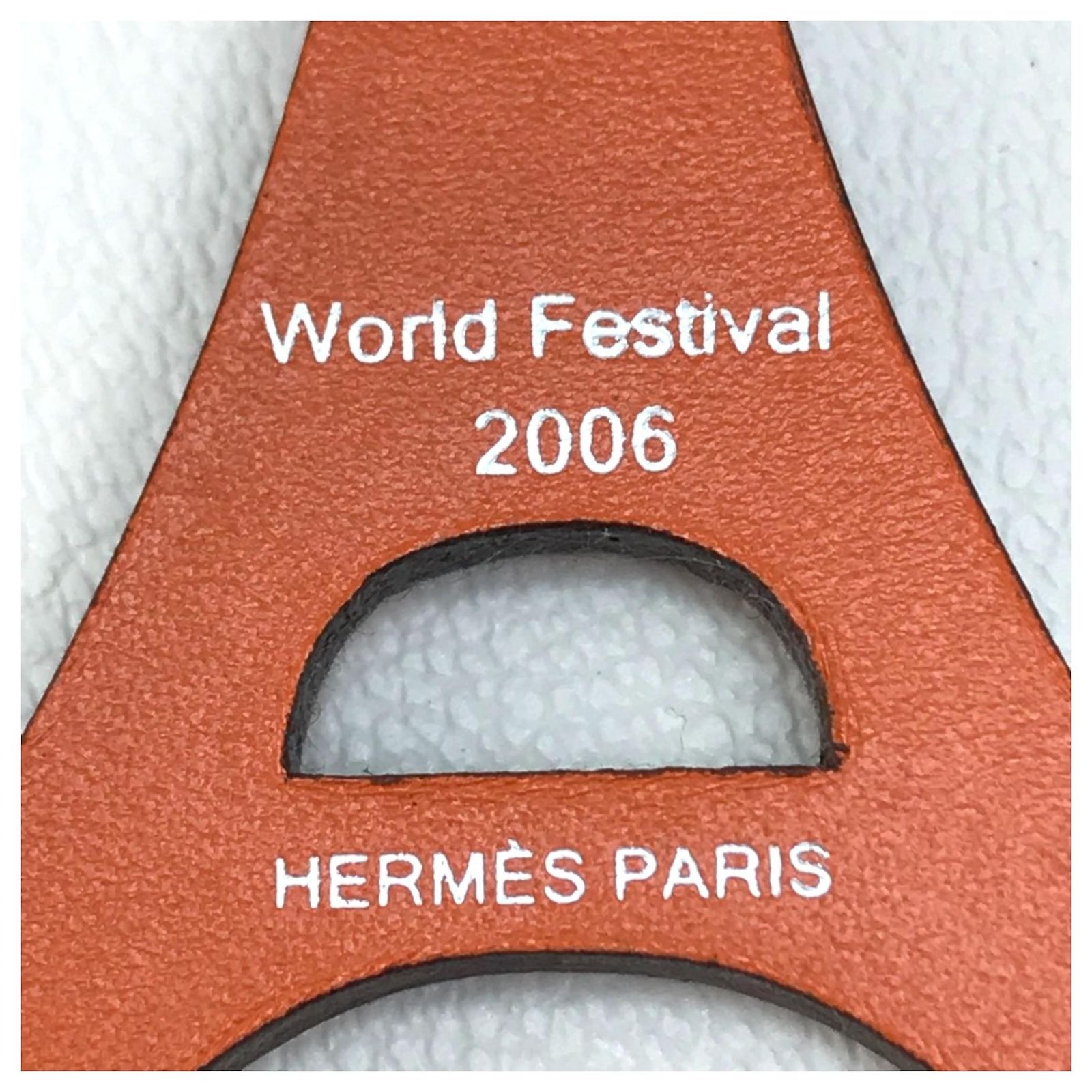 Porte-clés Hermès Tour Eiffel 2006 - Cuir Orange, Référence #755, Occasion Très Bon état