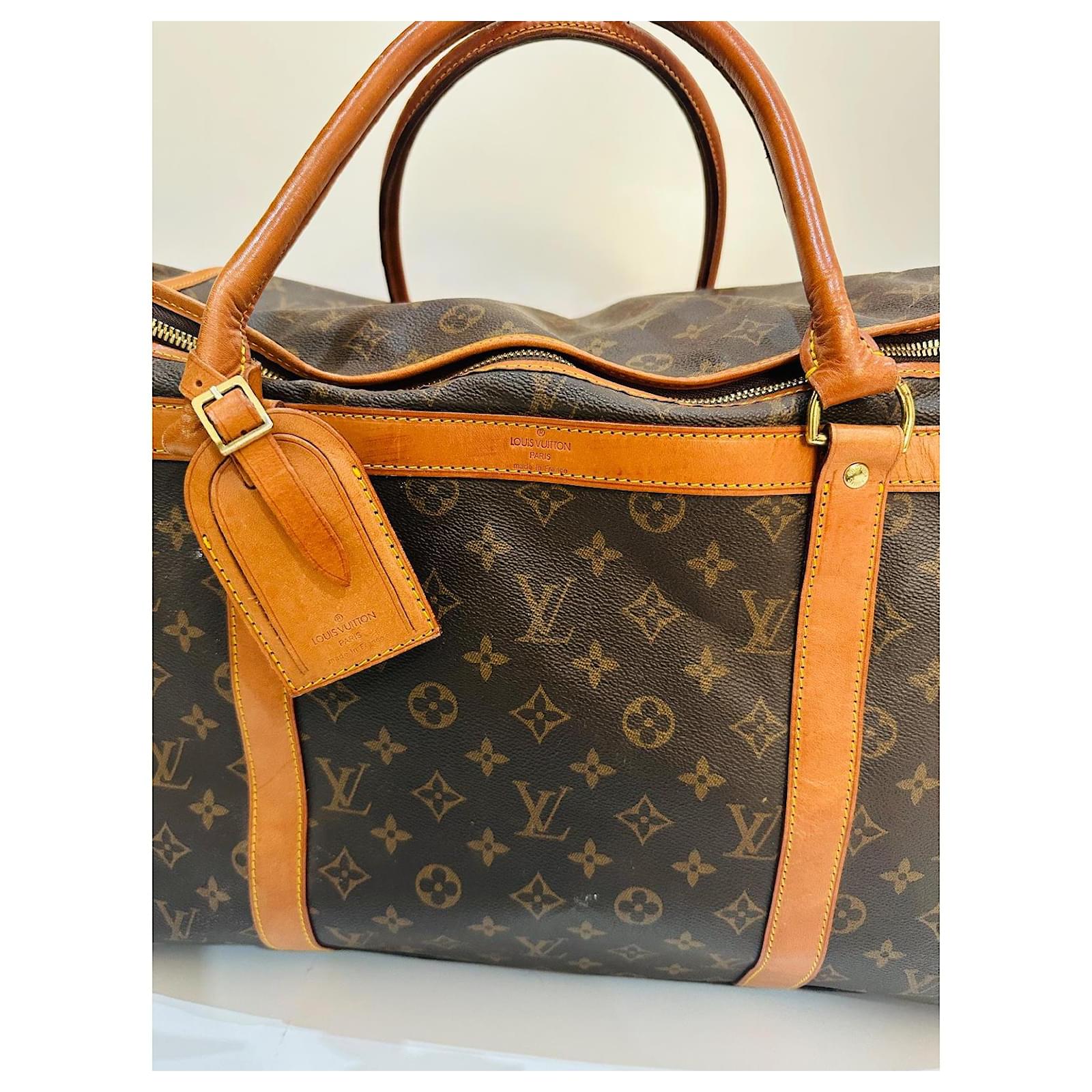 Keepall Louis Vuitton dog bag Brown Cloth  ref.2001867