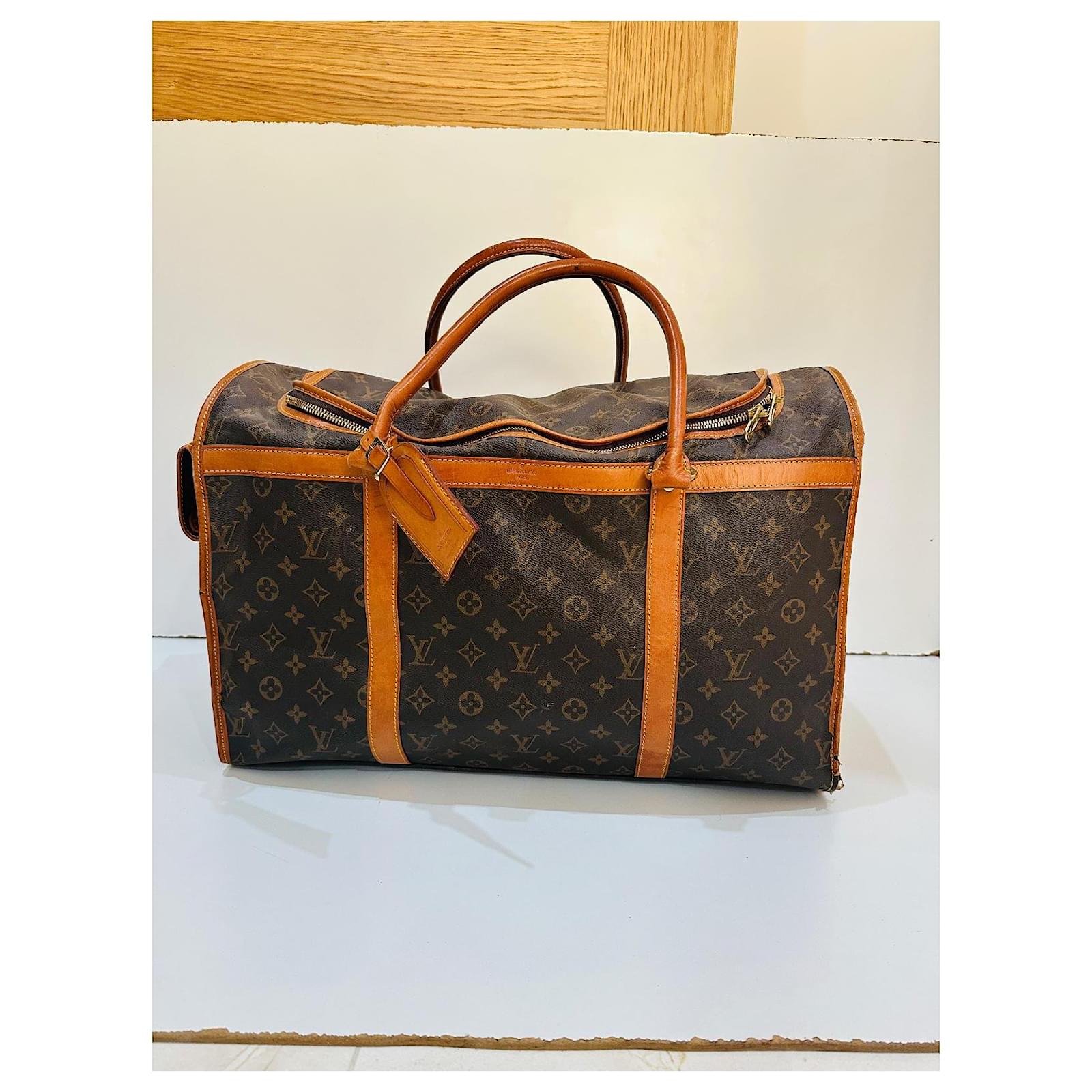 Keepall Louis Vuitton dog bag Brown Cloth  ref.2001867