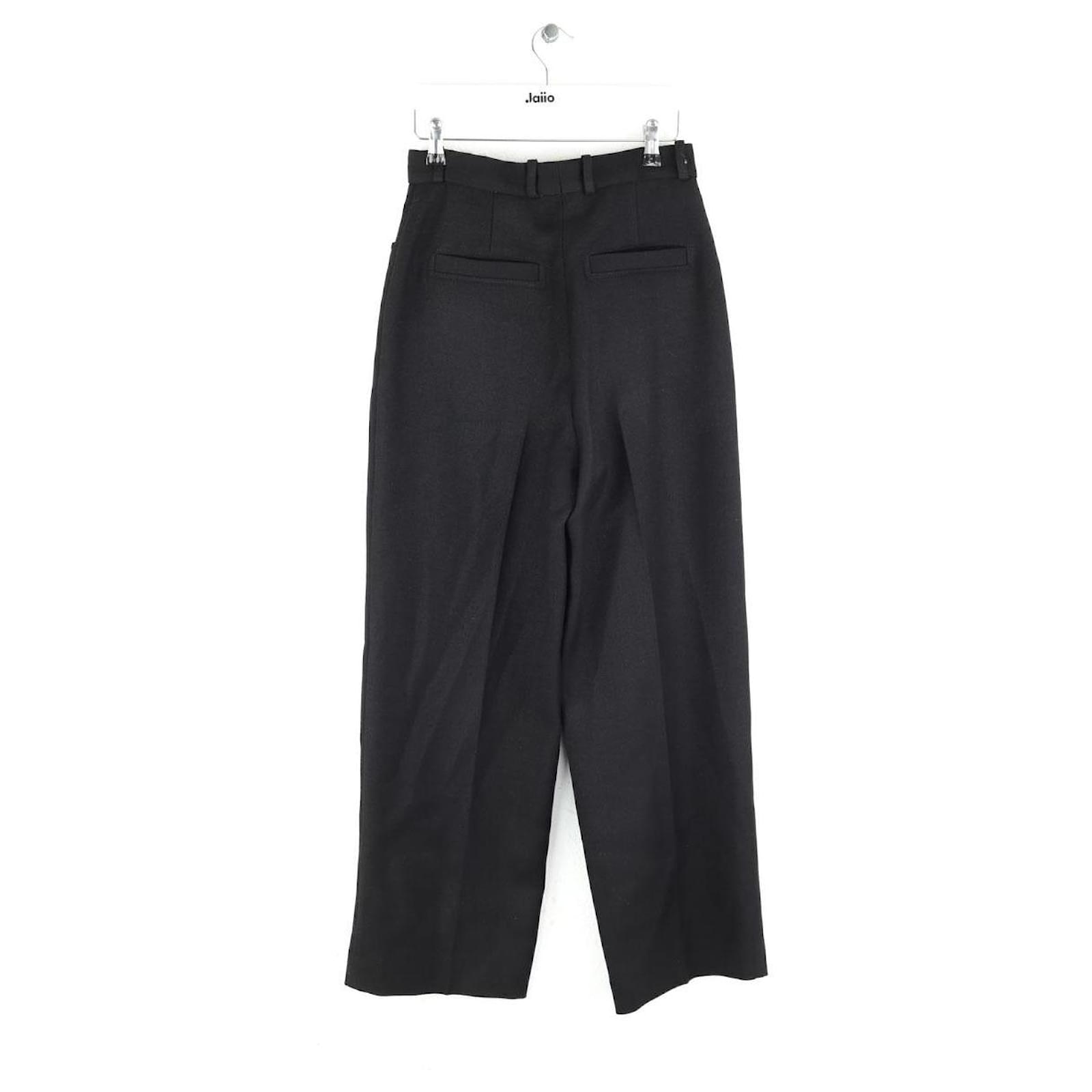 Sandro Pantalones anchos negros Sintético Joli Closet