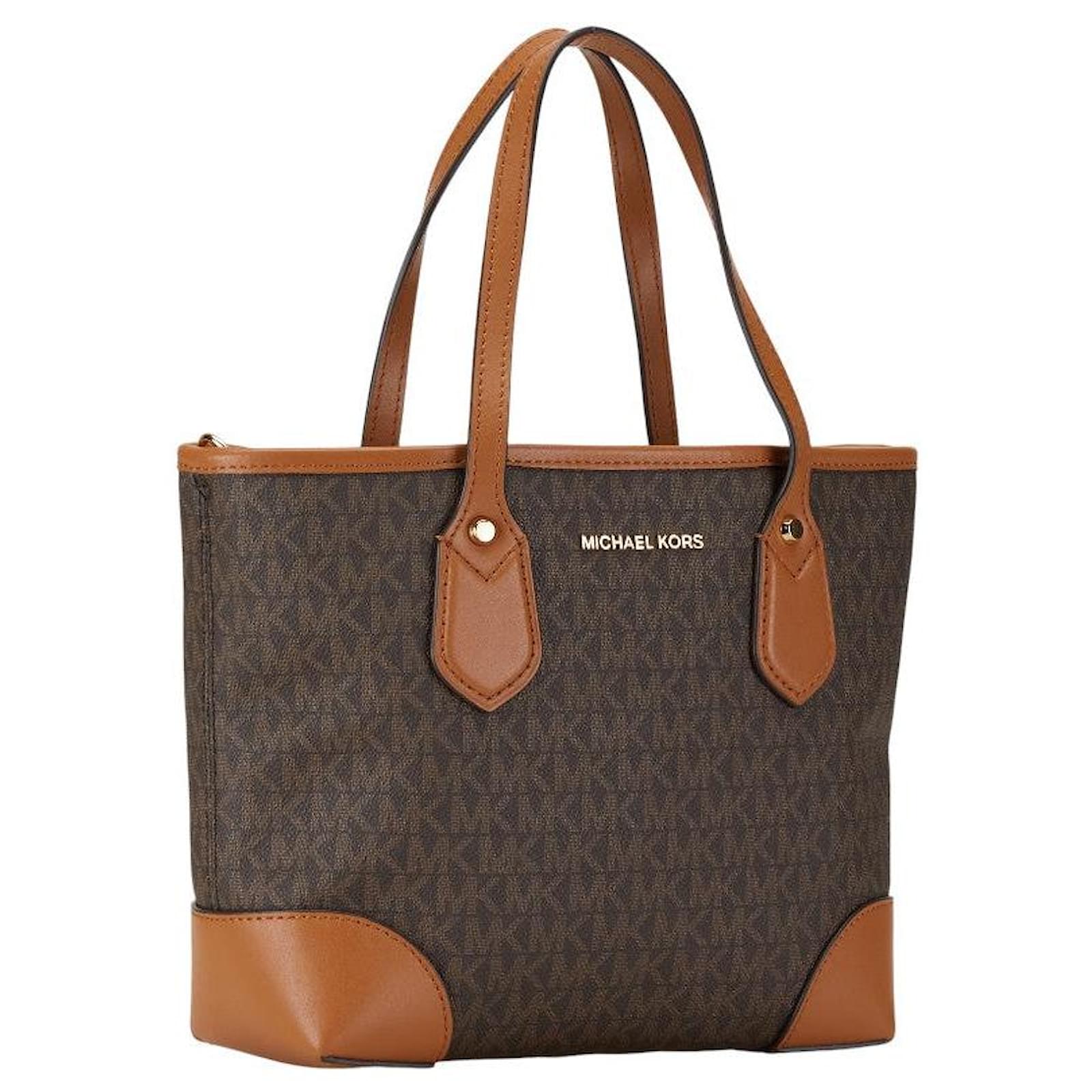 Michael Kors Monogram EVA Extra Small Handbag Brown Cloth ref