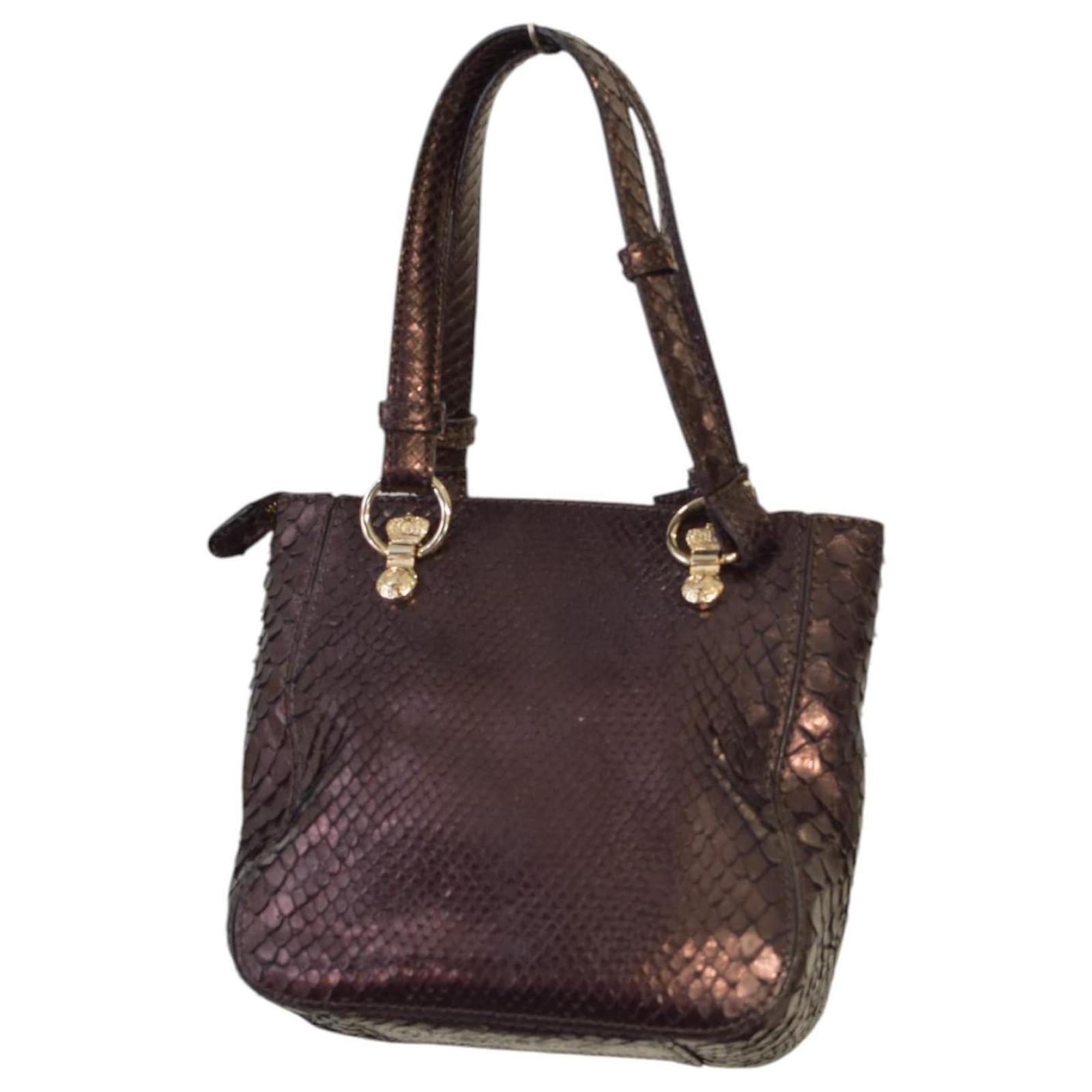 Iceberg Bolsos de mano Castaño Cuero Joli Closet