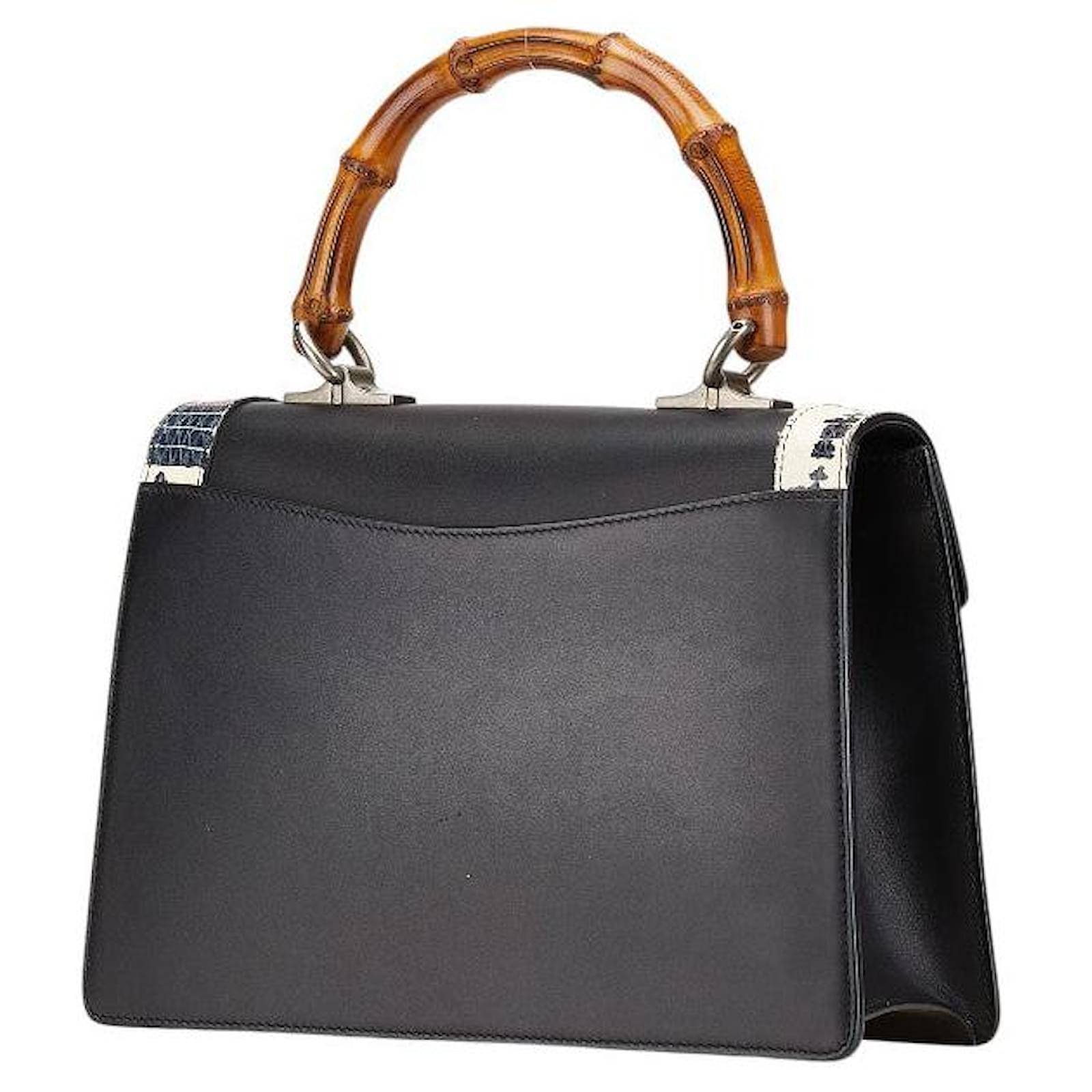 Bolso en Gucci de piel de pitón Lilith serpiente de coral