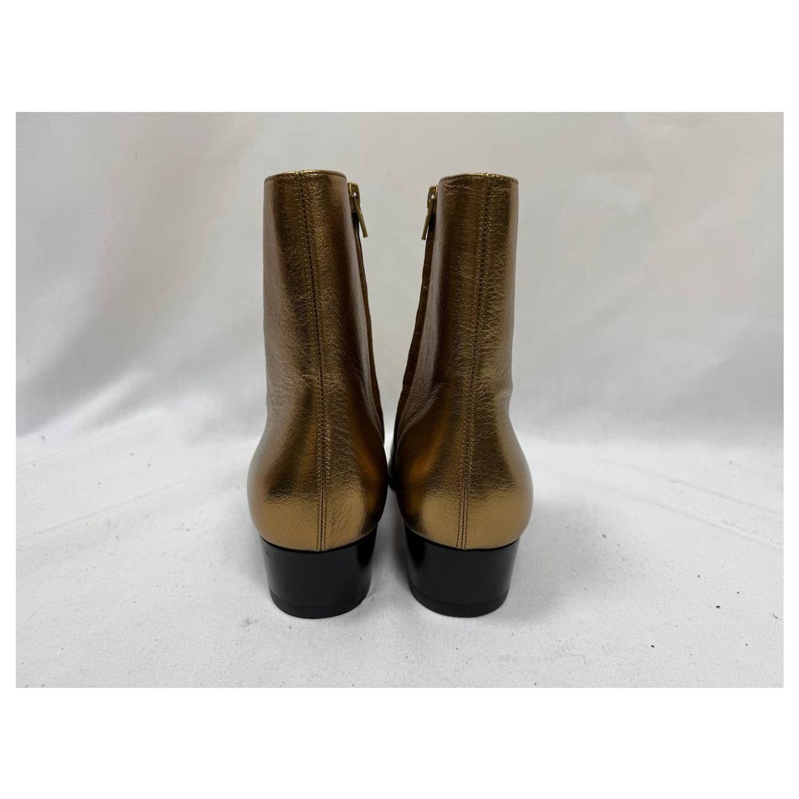 St Laurent Wyatt in metallic gold leather Do you have many of those pieces that everybody else slept on? main image 3