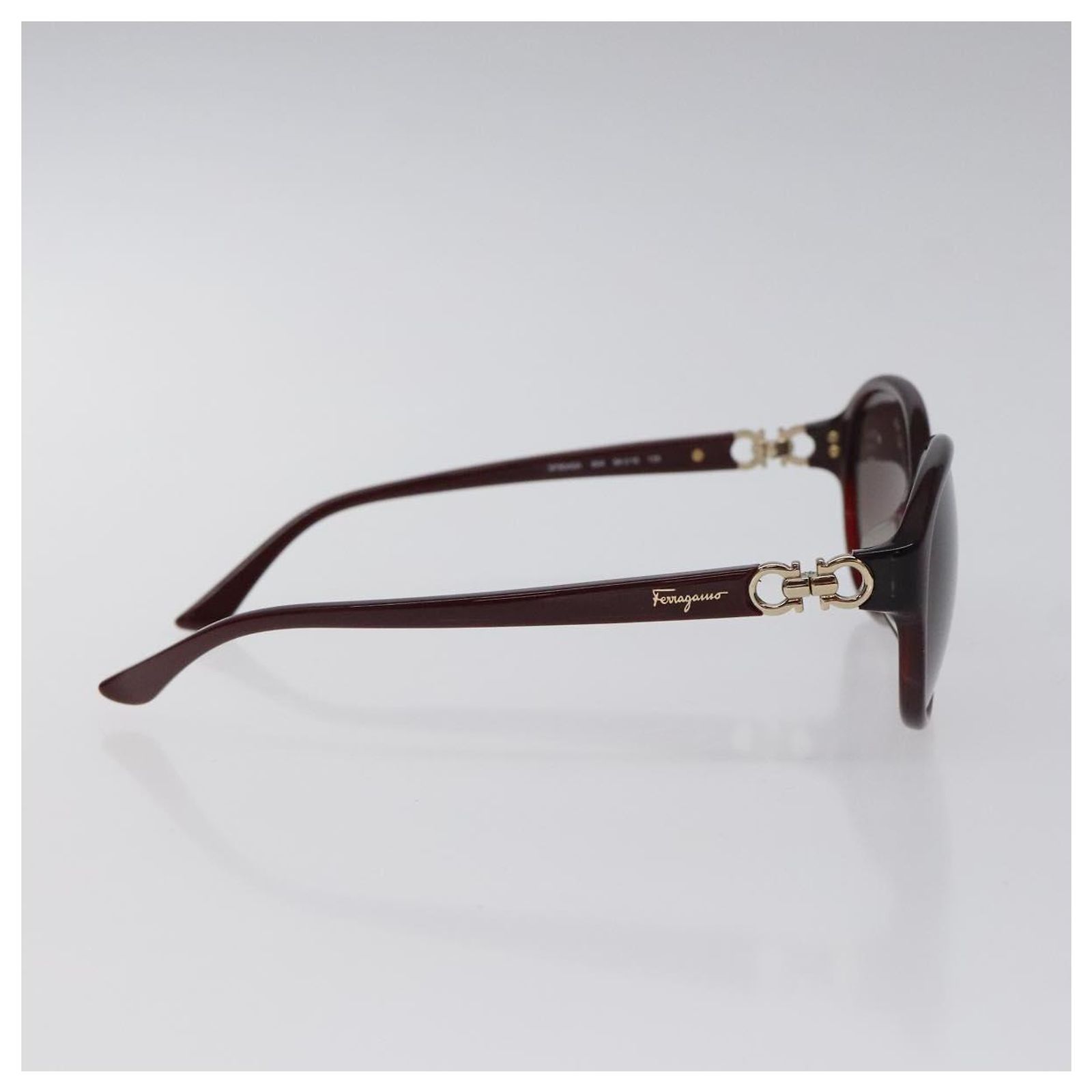 Salvatore Ferragamo Gancini Sunglasses plastic Brown Auth Amazon.com: Ferragamo Brown Gradient Oval Sunglasses SF668  main image 3