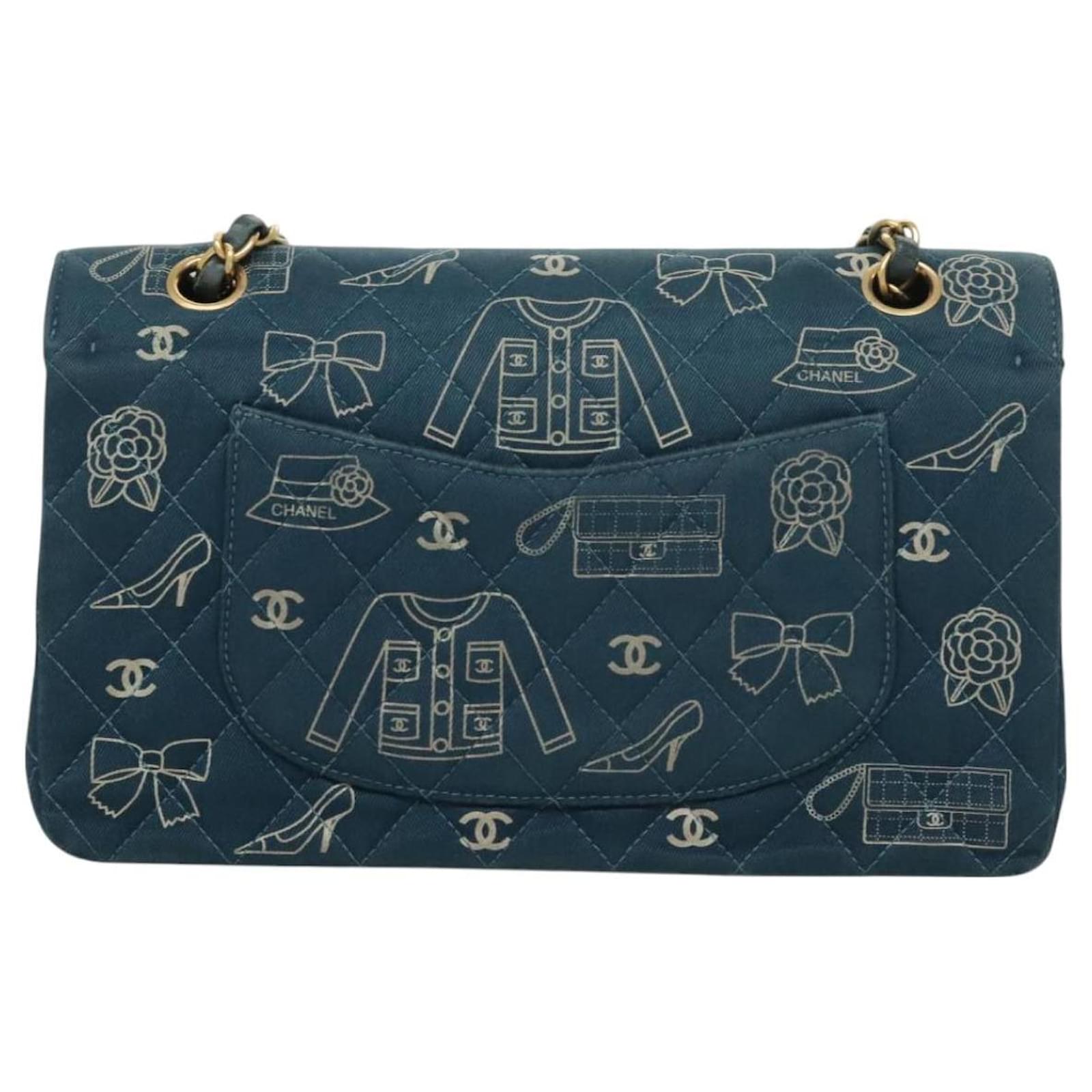 Bolso de hombro de lona acolchada Icon Line de CHANEL, azul marino