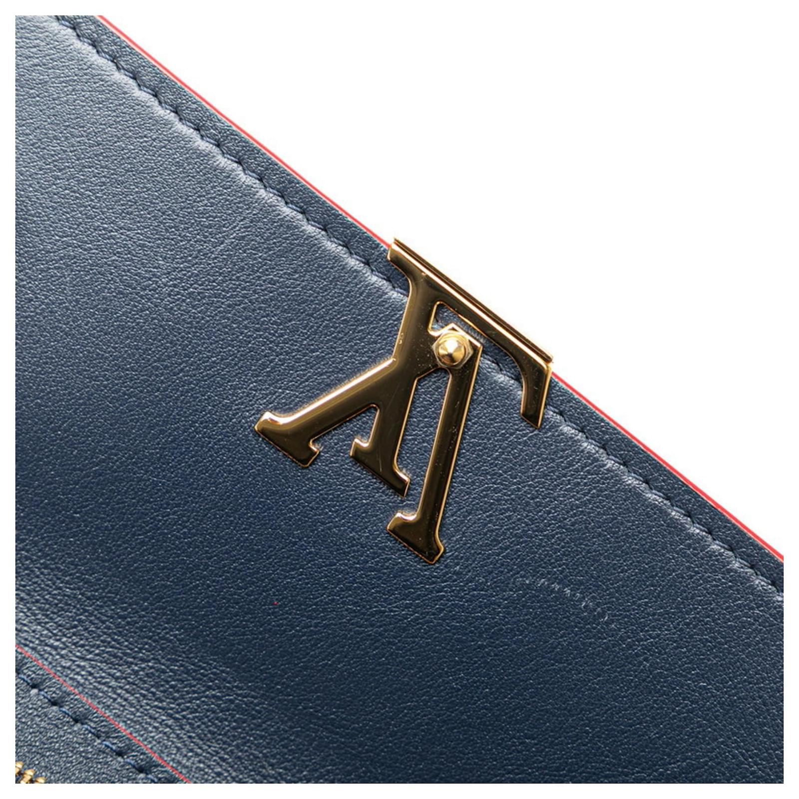 Louis Vuitton Portefeuille Capucines Tri-fold Wallet Red Navy blue Leather  ref.2333556