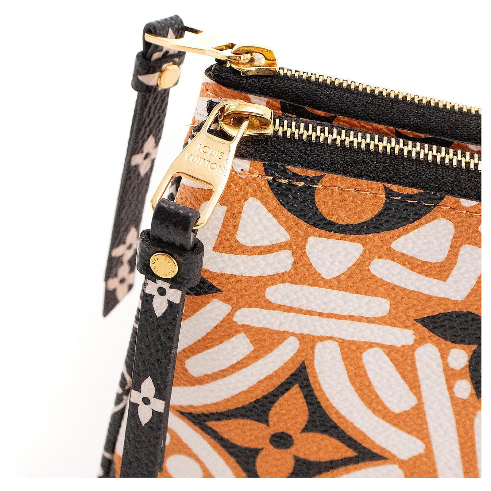 LOUIS VUITTON - Pochette Double Zip Crafty dition limite Louis Vuitton en toile monogramme Orange Leather  ref.2355294