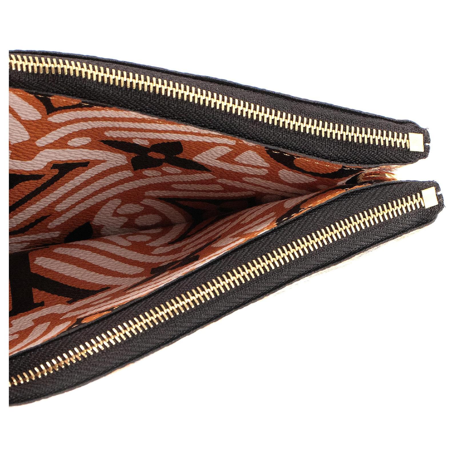 LOUIS VUITTON - Pochette Double Zip Crafty dition limite Louis Vuitton en toile monogramme Orange Leather  ref.2355294