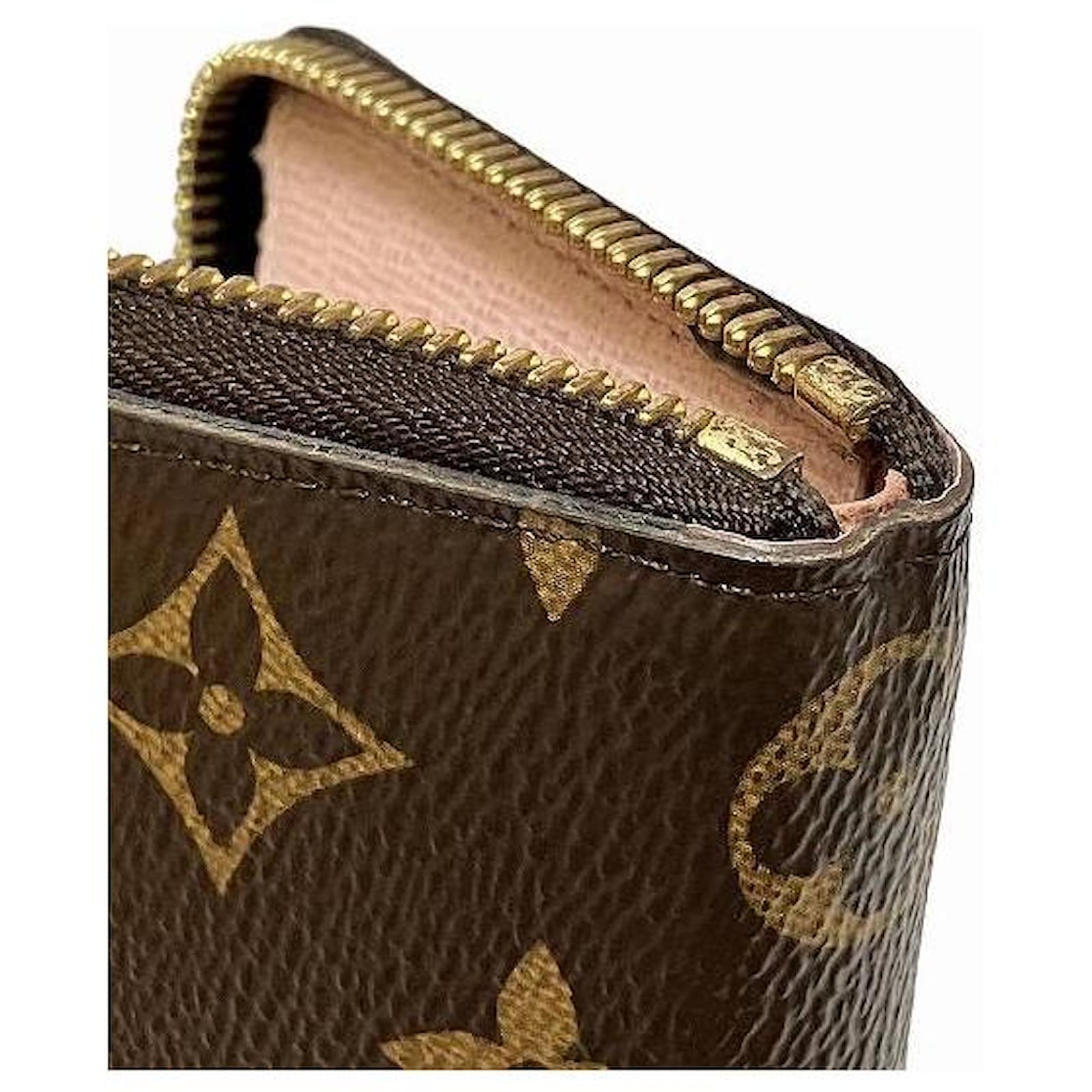 Portafoglio Clemence Monogram Louis Vuitton Marrone Tela ref