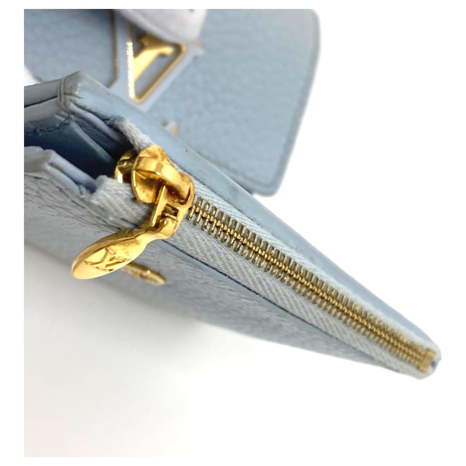 Louis Vuitton Portefeuille Capucines XS Compact Tri-fold Wallet Blue Leather  ref.2424706