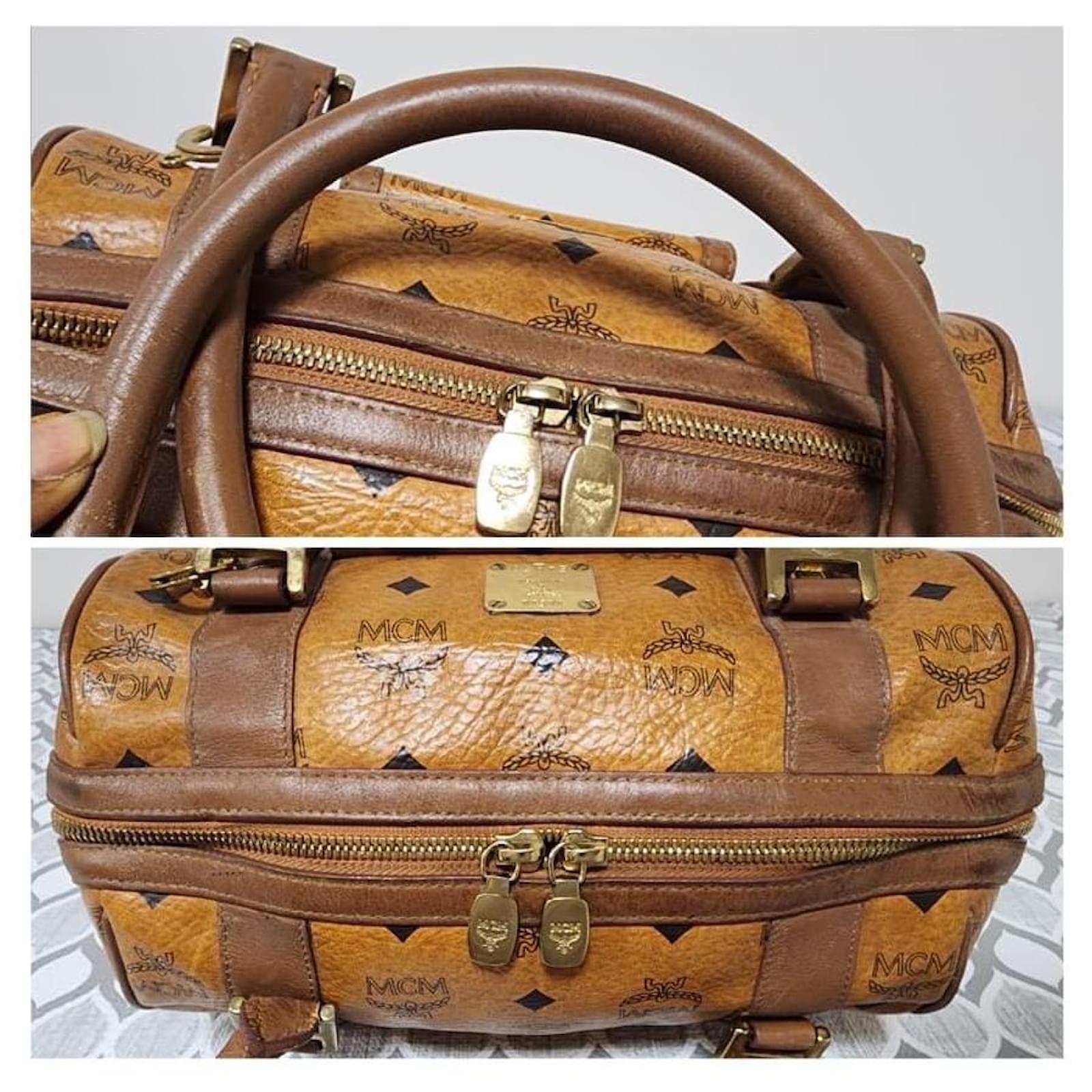 バッグ MCM Visetos Front Pocket Boston Bag MCM Visetos Coated Canvas and Leather Front Pocket Boston Bag