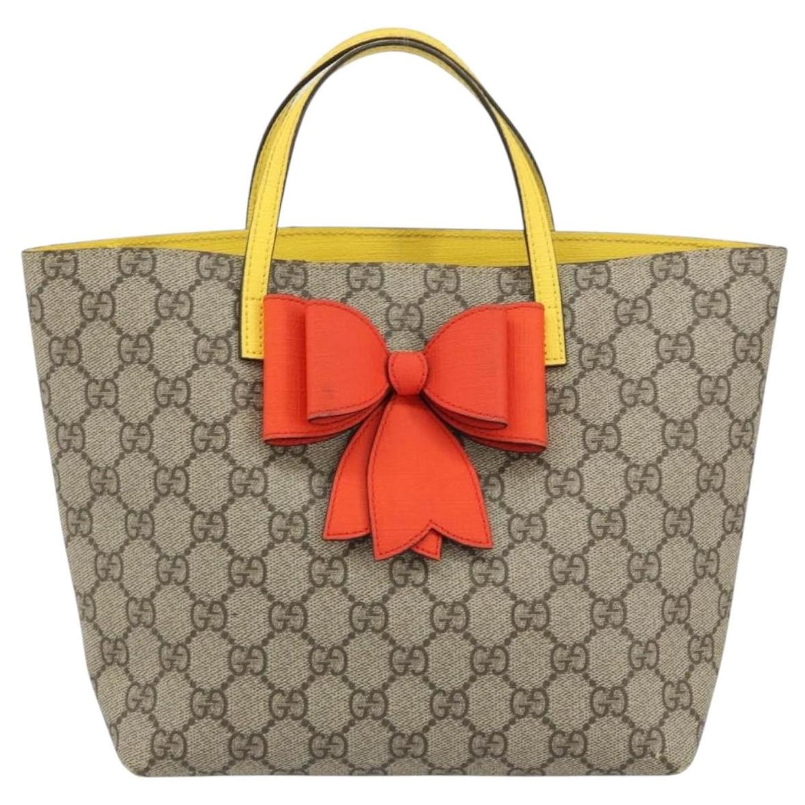 GUCCI グッチ トートバッグ GGスプリーム リボン イエロー 457232 GUCCI GG Supreme Hand Bag PVC Beige Gold 457232 Auth bs31686