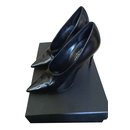 Bomba de pelúcia em couro brilhante - Yves Saint Laurent