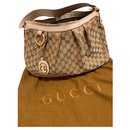 Gucci beige / bolsa marrón