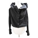 New Gestuz black jacket with foldable hood. XS/S