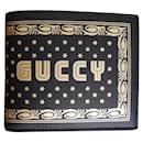 Portefeuille en cuir Gucci (Guccy)